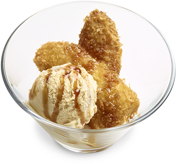 Desserts 桌布 壁紙 — 玻璃碗中盛裝著 creamy 香草冰淇淋，上面放有金黃色炸麵團塊和焦糖醬。