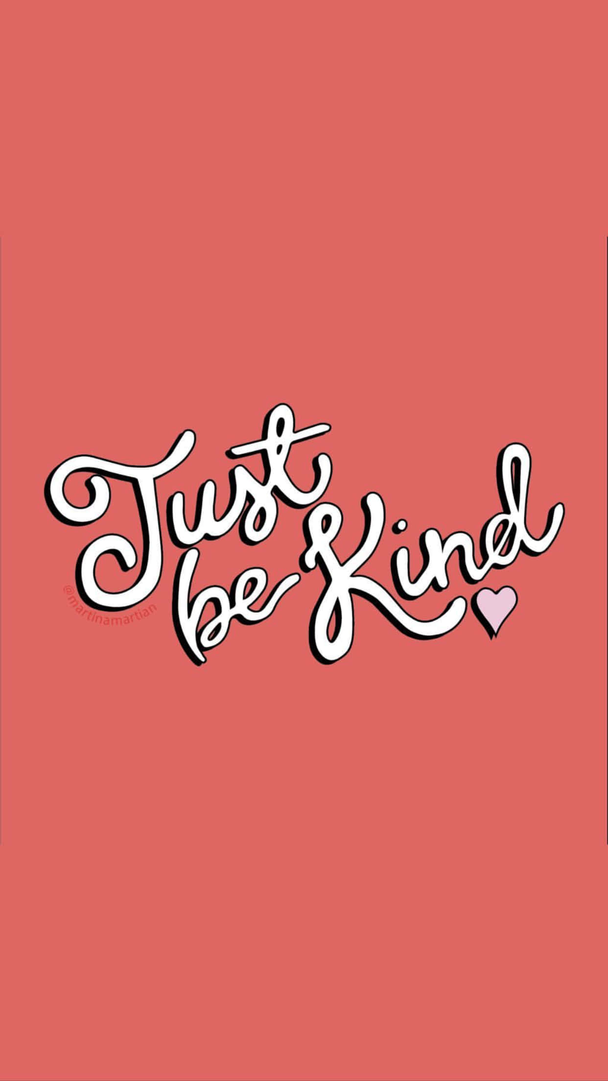 語錄 桌布 壁紙 — 珊瑚粉紅色背景上，以優雅的白色草書顯示「Just be Kind」字樣，並在「Kind」旁邊有一個小心形。