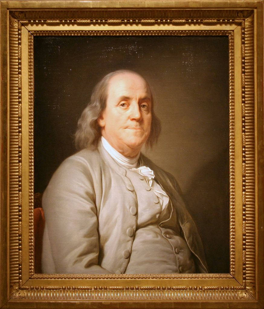 Franklin 桌布 壁紙 — 班傑明·富蘭克林的經典油畫肖像，身穿灰色外套和白色領巾，鑲嵌在華麗的金色畫框中，背景深色。