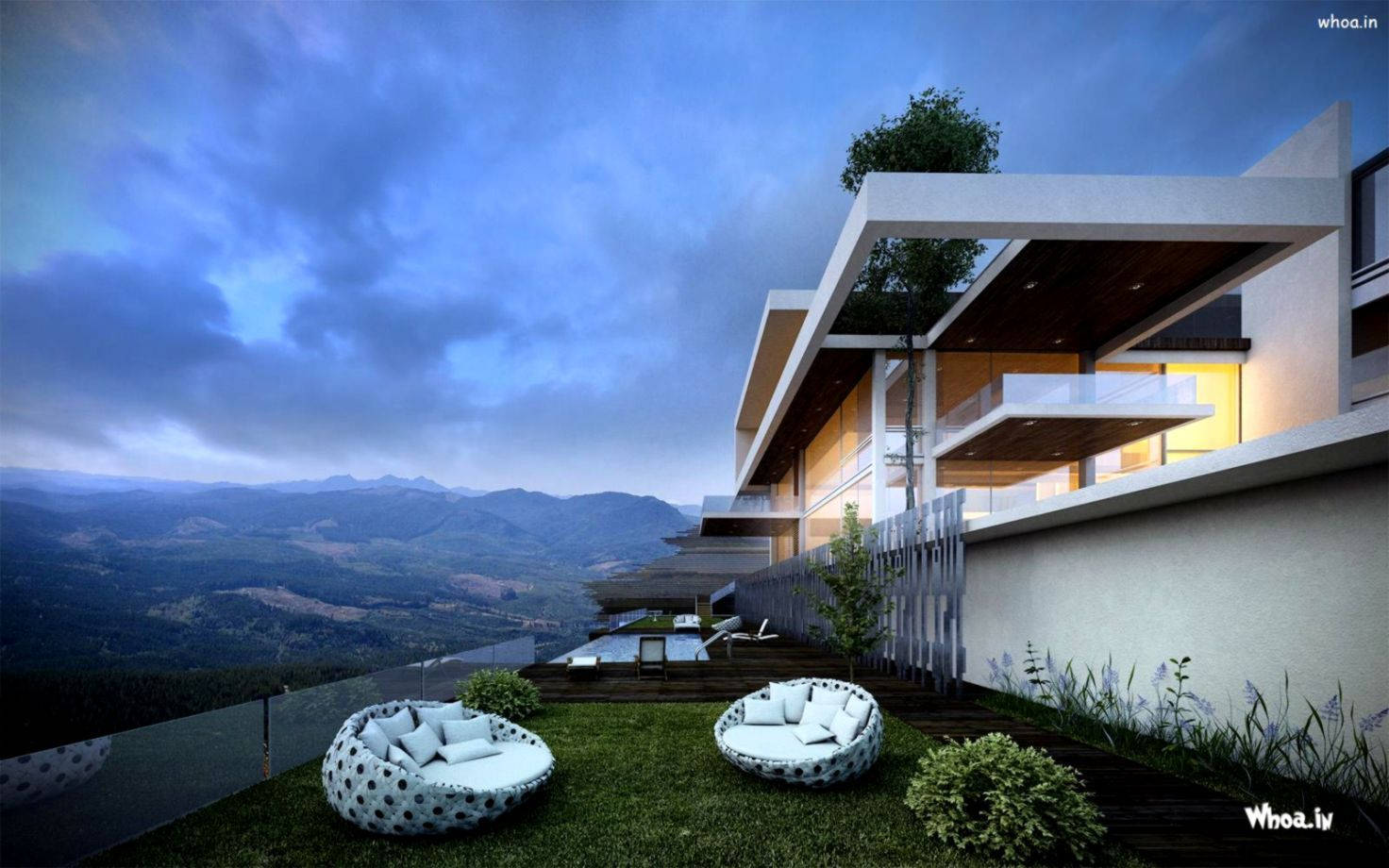 Luxury House 桌布 壁紙 — 現代別墅坐落在山脊上，發光的窗戶和圓形躺椅俯瞰黃昏時分的山谷。
