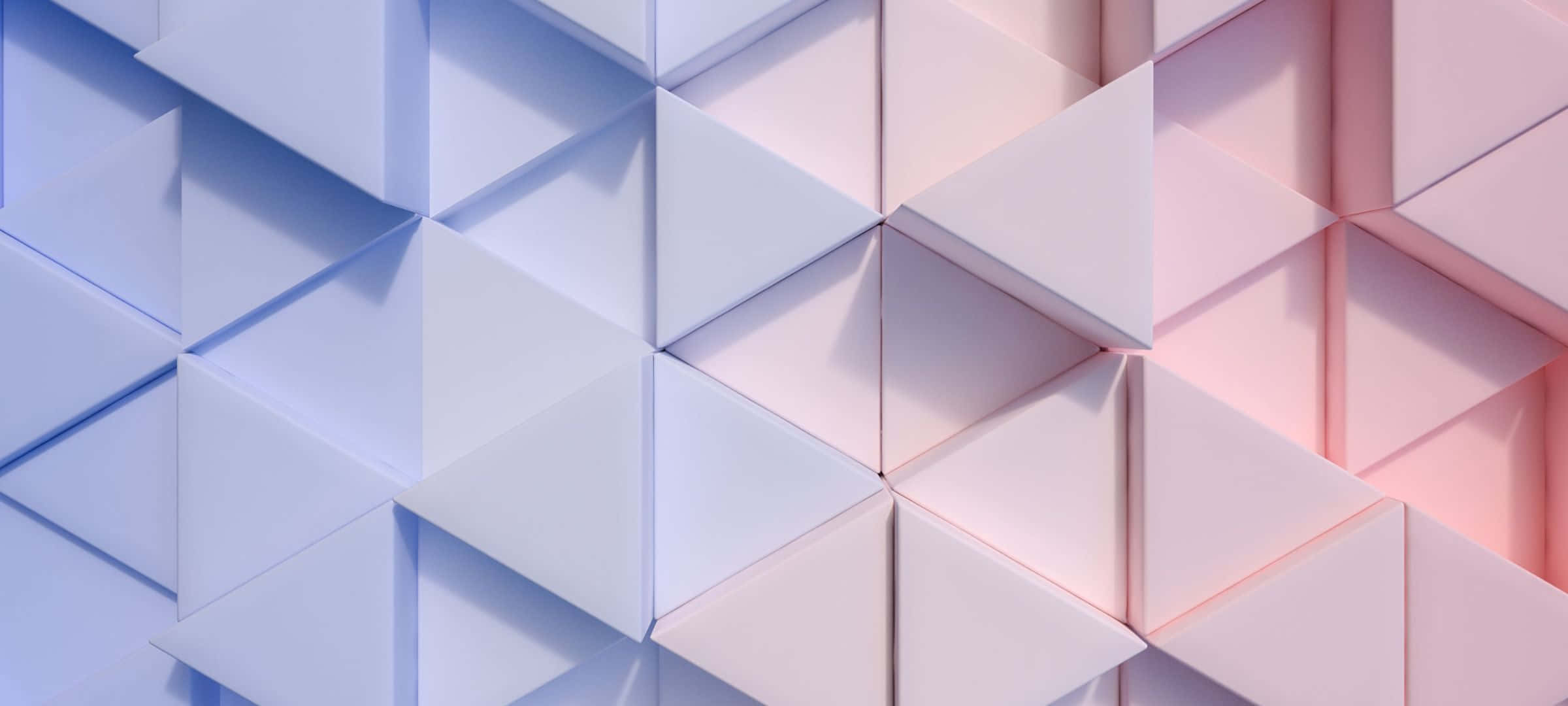 2400x1080 桌布 壁紙 — 現代幾何圖案壁紙，採用柔和藍色和粉紅色三角形面板，營造出舒緩的3D抽象圖案。
