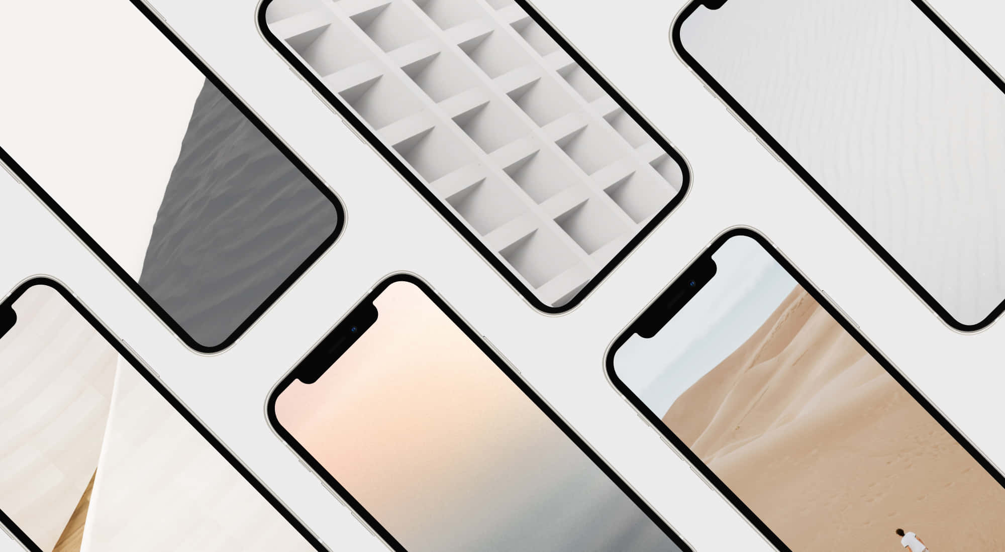 Minimal iPhone 桌布 壁紙 — 現代智慧型手機配以時尚黑色邊框，展示多種桌布，包括沙漠沙丘、抽象圖案和極簡紋理。