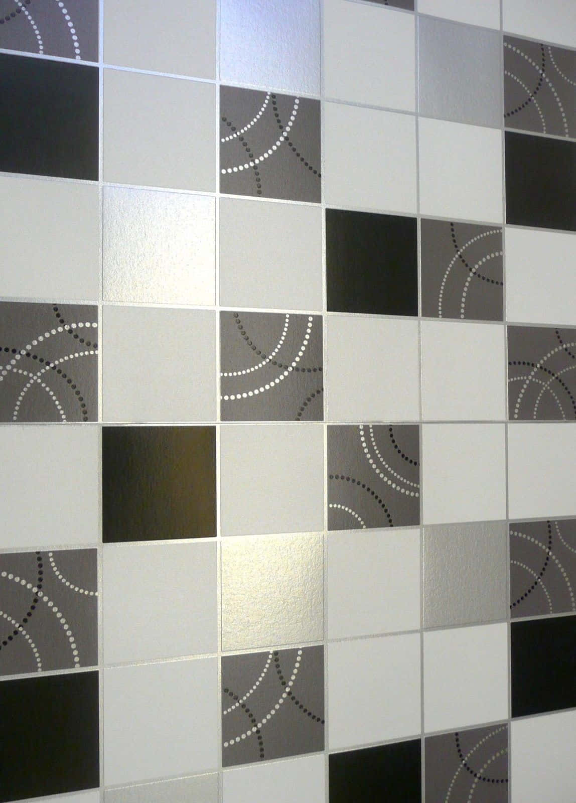 Tiles 桌布 壁紙 — 現代瓷磚牆的特寫，黑白灰方格交替排列，帶有圓點圓形圖案。