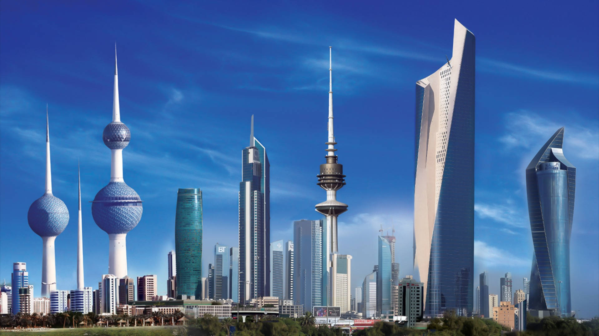 Kuwait 桌布 壁紙 — 現代科威特城天際線，擁有標誌性的科威特塔和時尚摩天大樓，在充滿活力的藍天下。