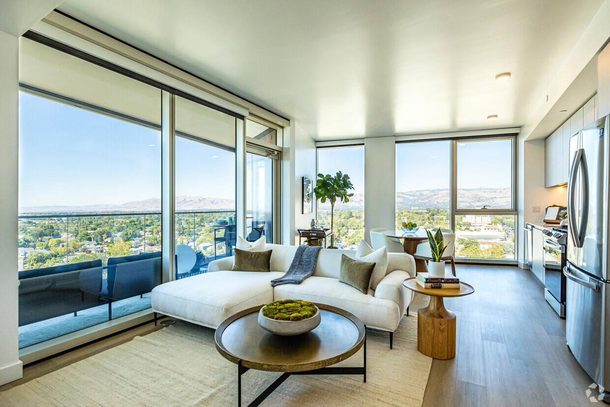 Interior Design 桌布 壁紙 — 現代簡約客廳，配白色沙發及木質點綴，透過落地窗俯瞰陽光普照的城市景觀。