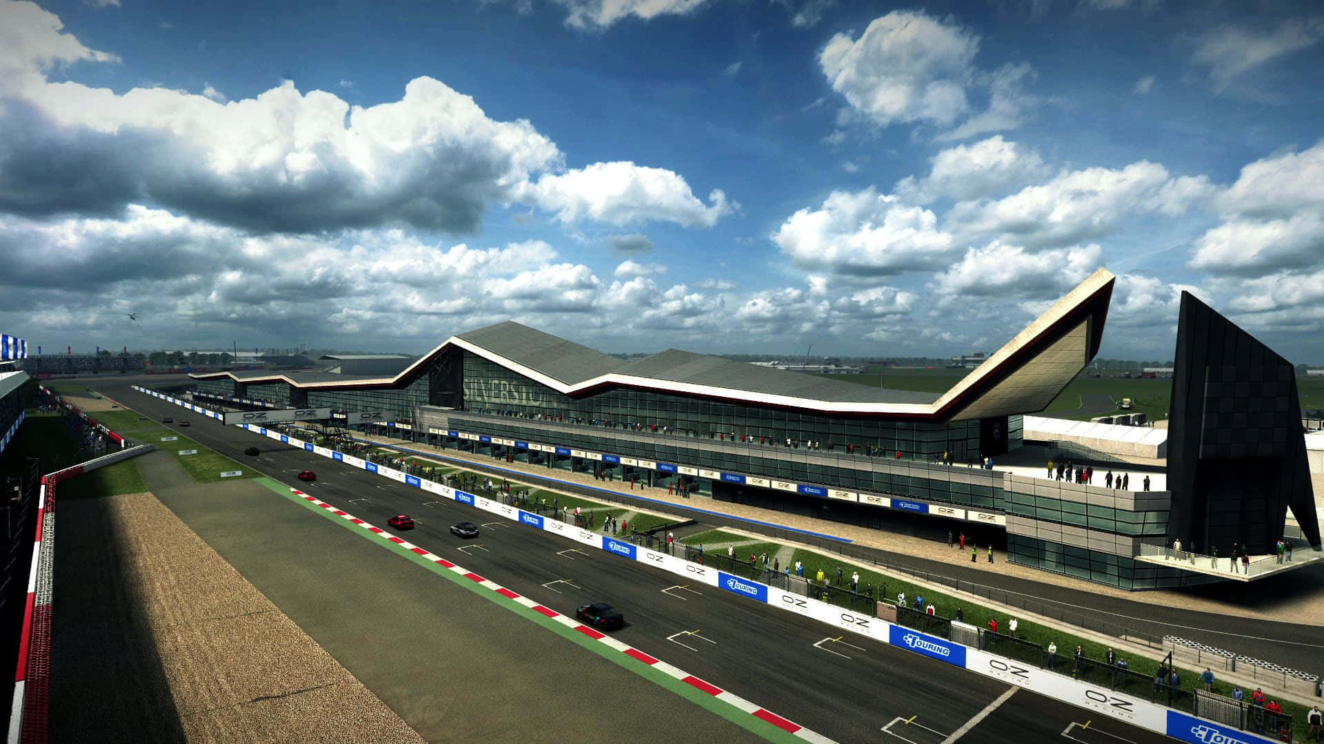 1080p Grid Autosport 桌布 壁紙 — 現代賽道，配以時尚玻璃看台，在戲劇性的多雲天空下，賽車在瀝青路面上飛馳。