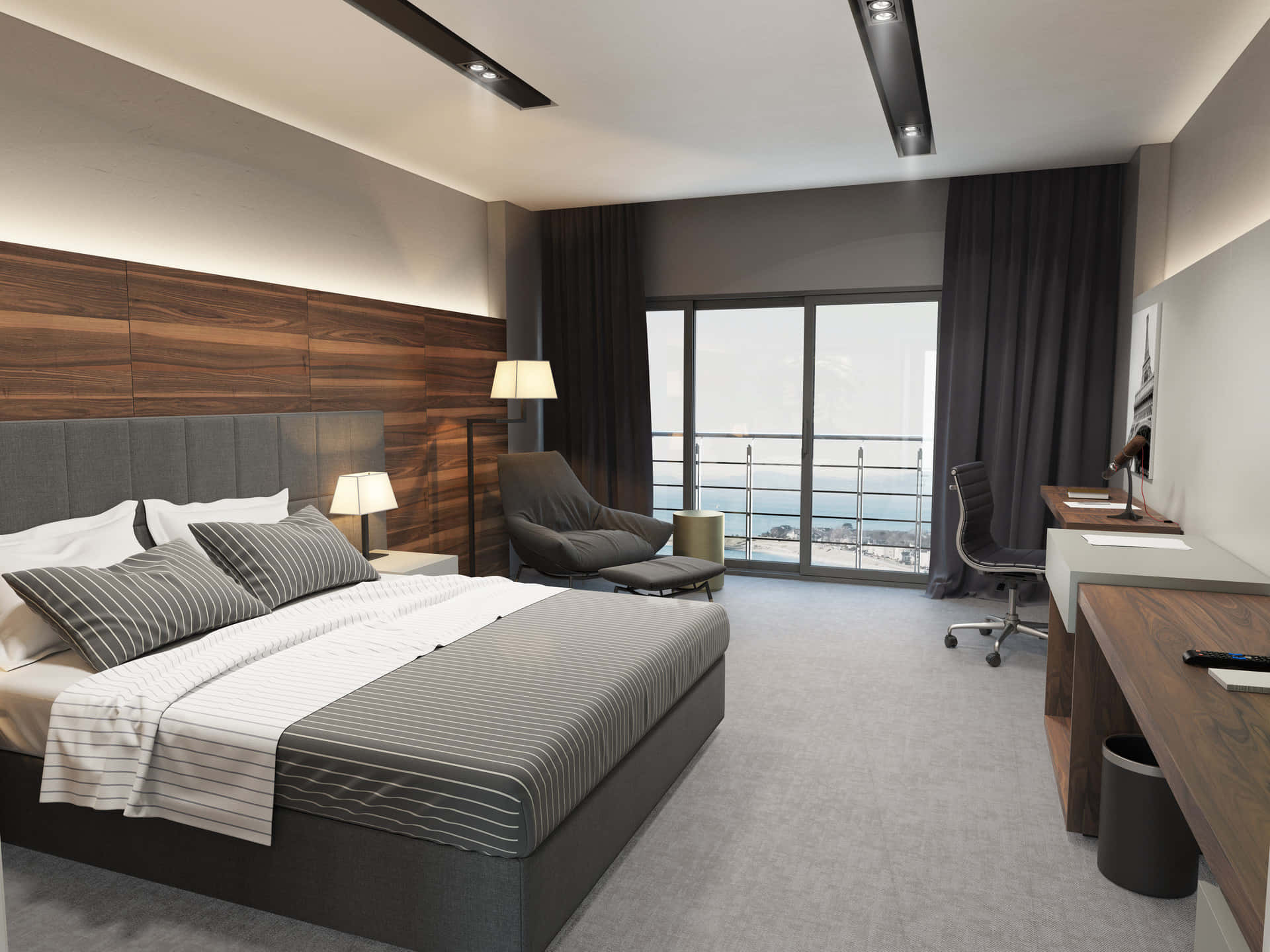 Hotel Room 桌布 壁紙 — 現代飯店客房，配有灰色床單、木質床頭板和可俯瞰海洋的陽台，光線明亮。
