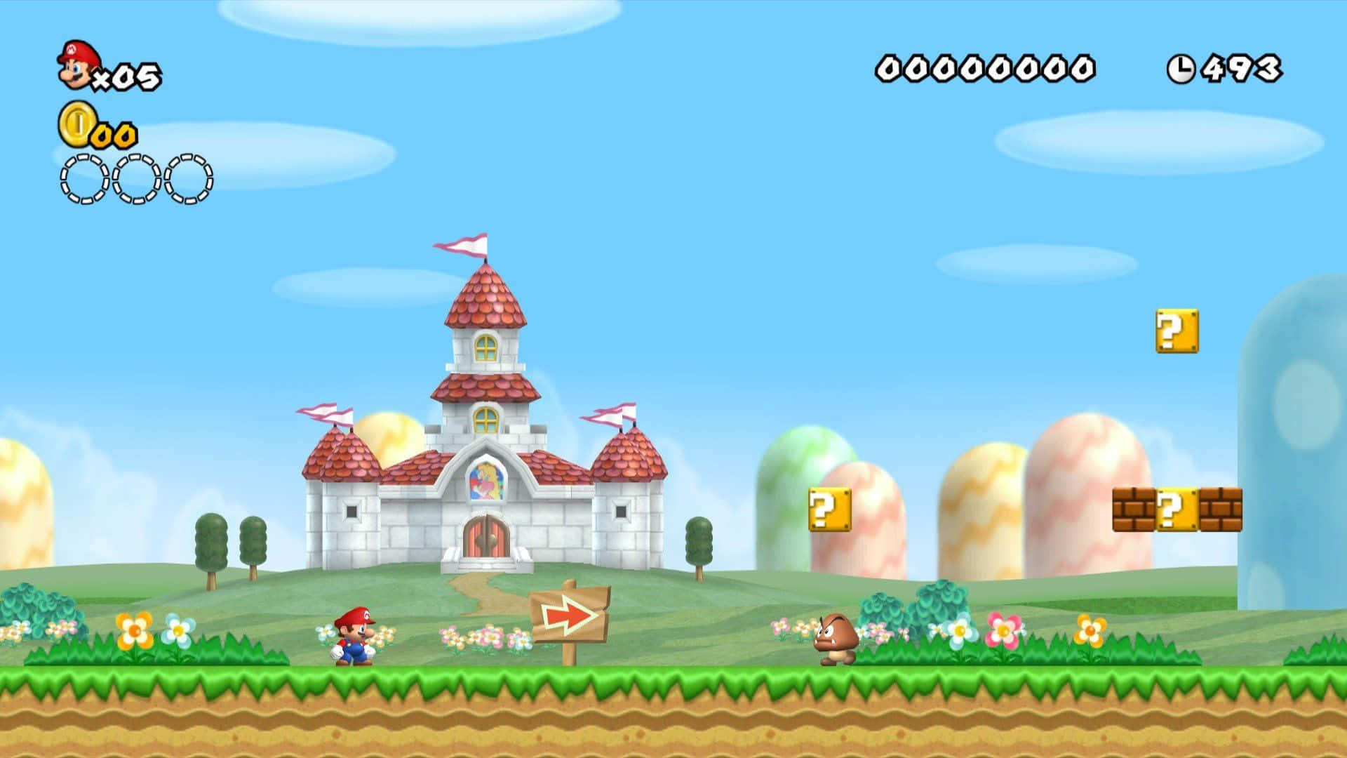 Mushroom Kingdom 桌布 壁紙 — 瑪利歐在明亮的藍天下，穿過草地跑向一個有紅色屋頂和問號方塊的城堡。