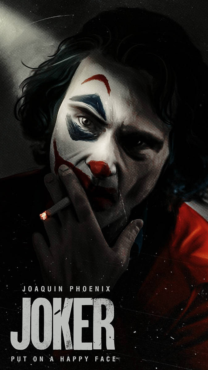 Joker 2019 桌布 壁紙 — 瓦昆菲尼克斯飾演的小丑近距離特寫，化妝模糊，手持點燃的香煙，背景黑暗粗糙。