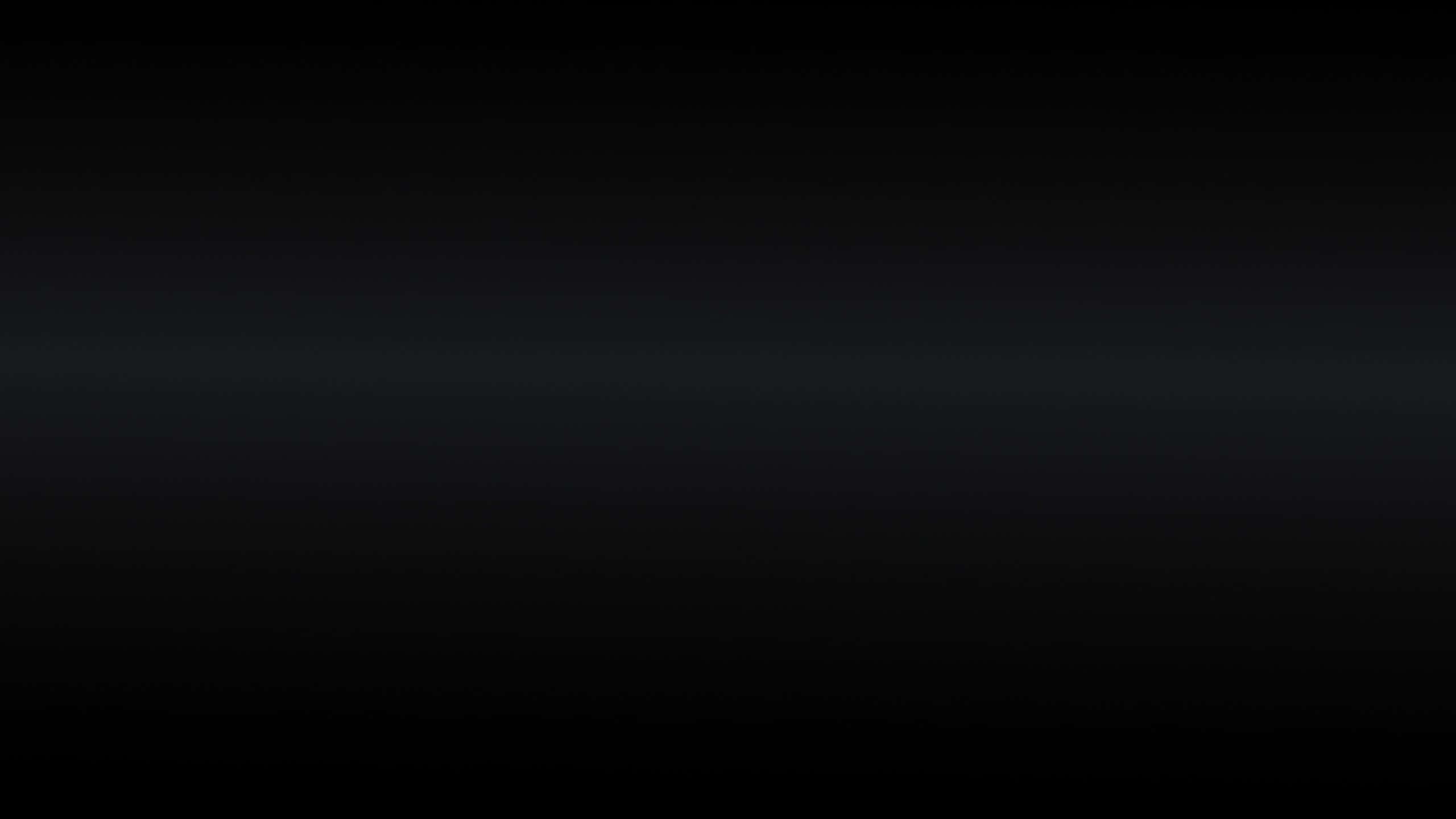 2560x1440 Black 桌布 壁紙 — 由深黑色漸變至接近黑色的色調，整個畫面帶有微妙的色調變化。