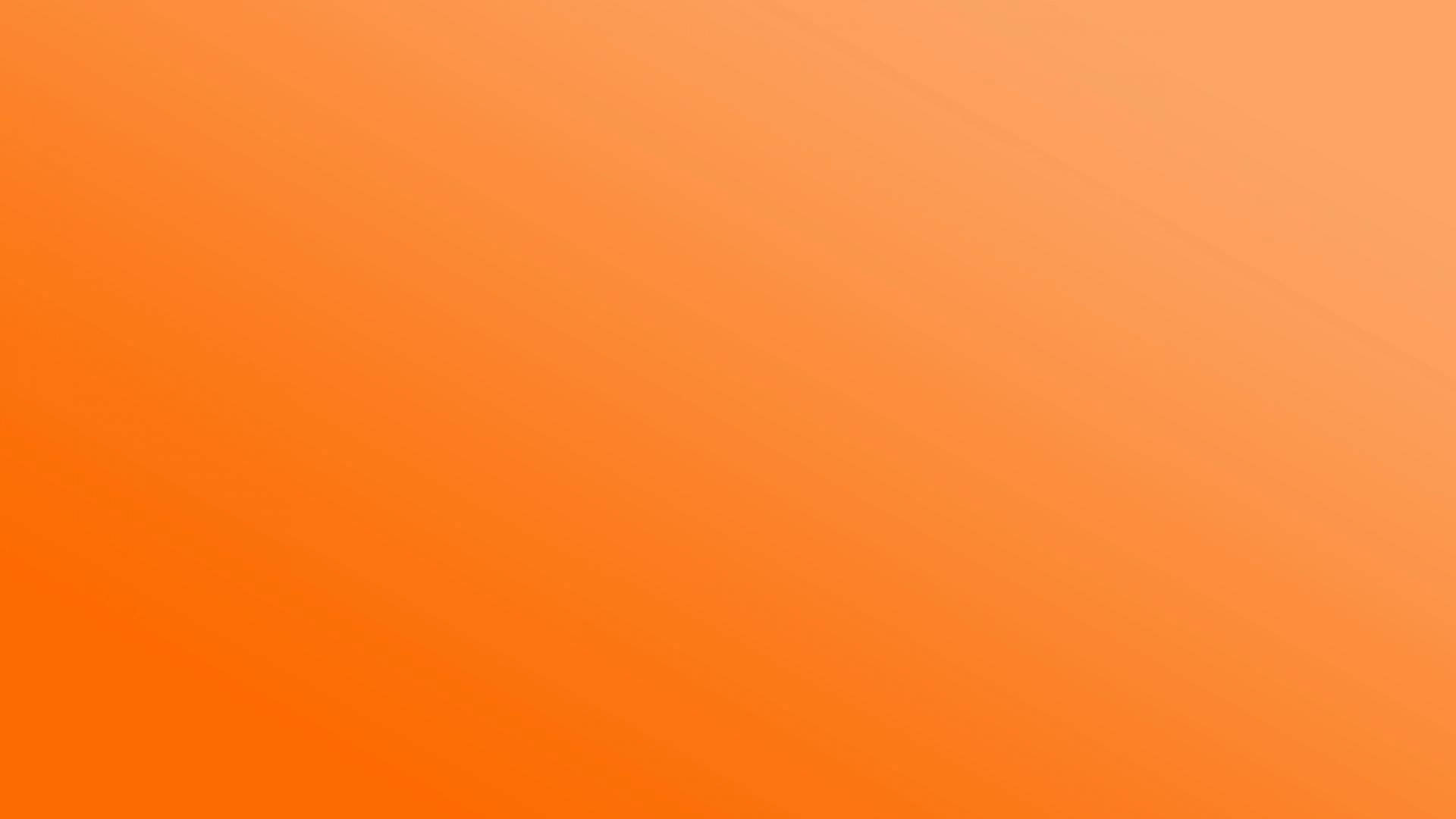充滿活力的橙色漸變背景，色彩過渡柔和。 — 純色動圖 壁紙