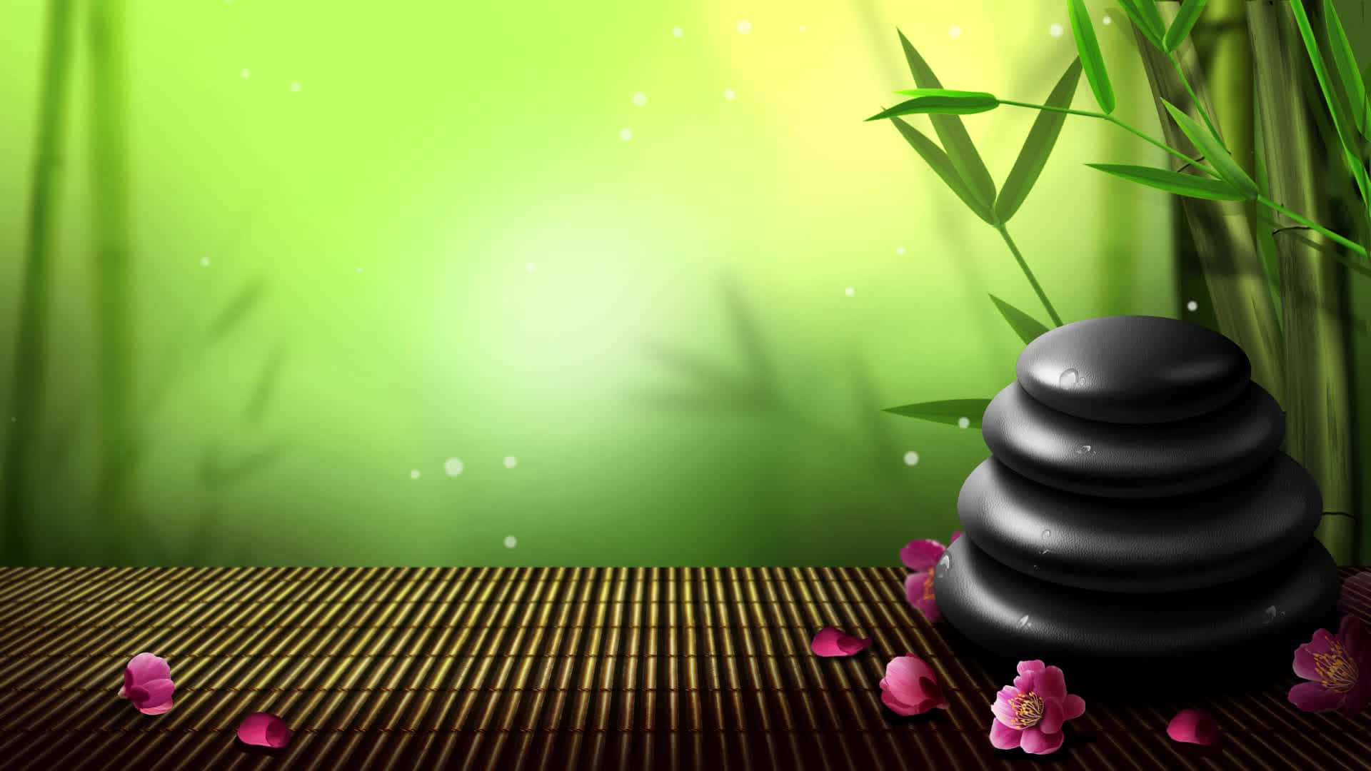 禪 桌布 壁紙 — 疊起的黑色水療石頭放在竹蓆上，旁邊有粉紅色的花朵，在發光的綠色竹林裡。