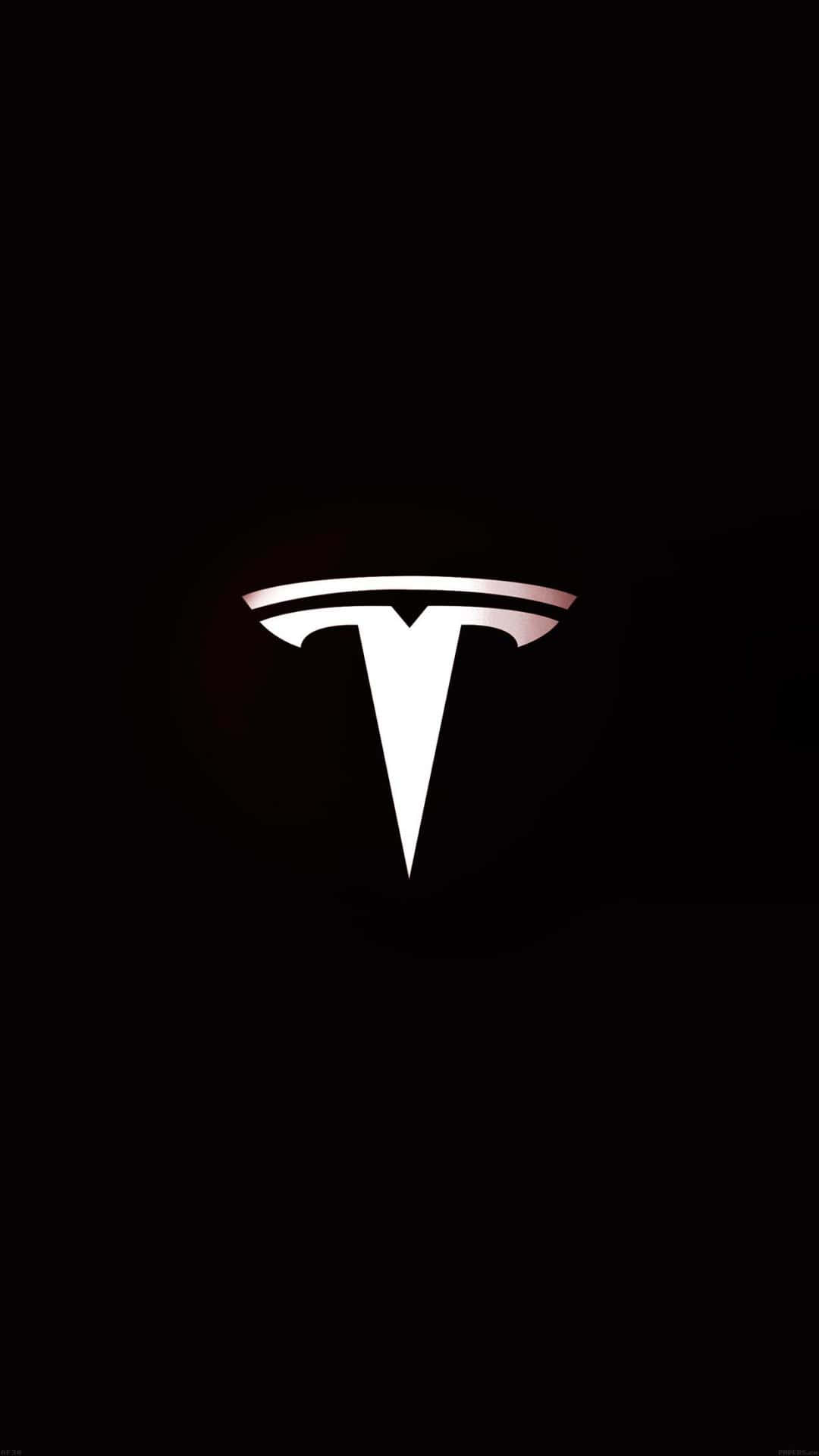 桌布 壁紙 — 發光的 Tesla 標誌居中於黑色背景上，帶有微妙的漸變高光。