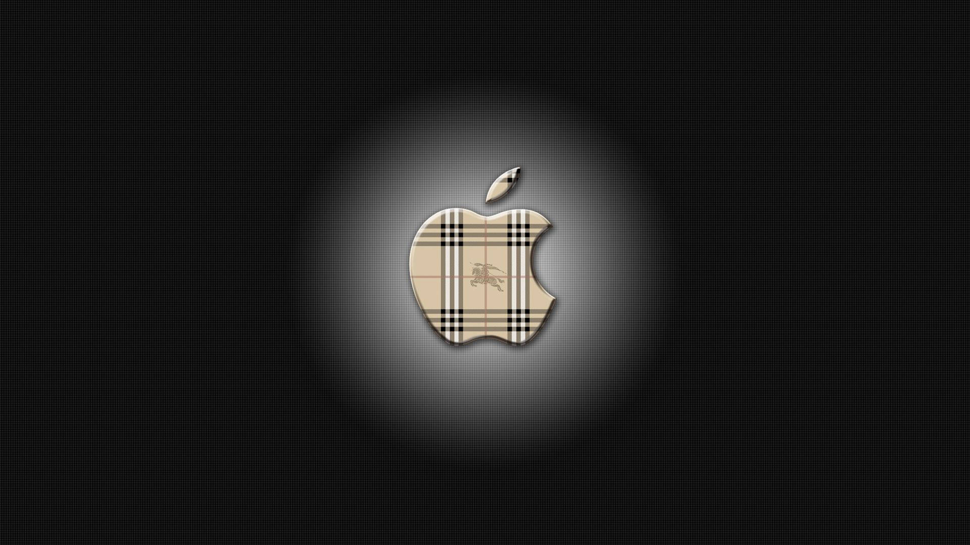 Burberry 桌布 壁紙 — 發光的Apple標誌，帶有Burberry格紋圖案，居中於深色紋理背景上。