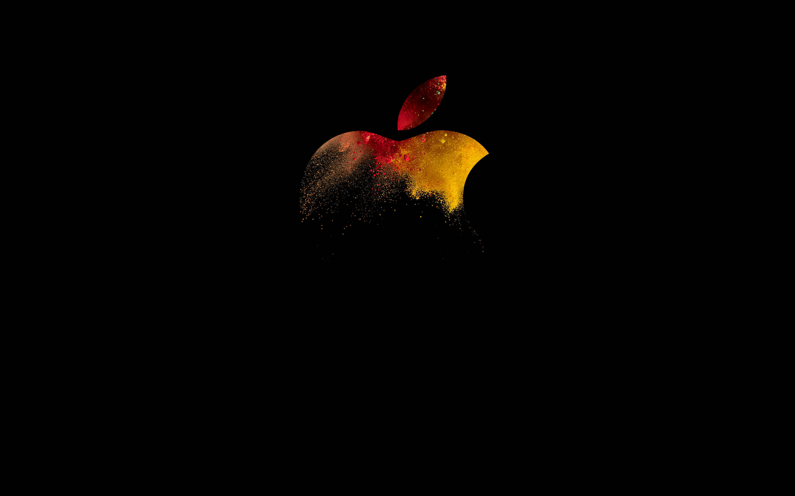 macbook pro 桌布 壁紙 — 發光的Apple標誌在純黑背景上分解成紅色和金色粒子。