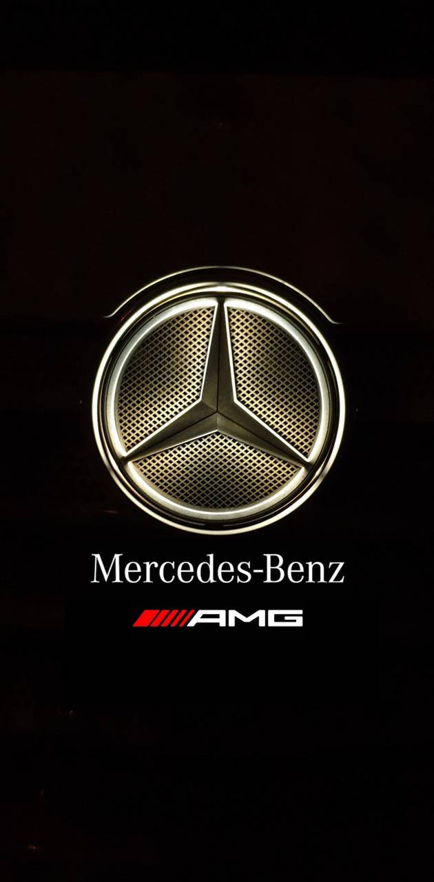 Amg 桌布 壁紙 — 發光的Mercedes-Benz AMG標誌，在黑暗背景上帶有金屬光澤和紅色點綴。