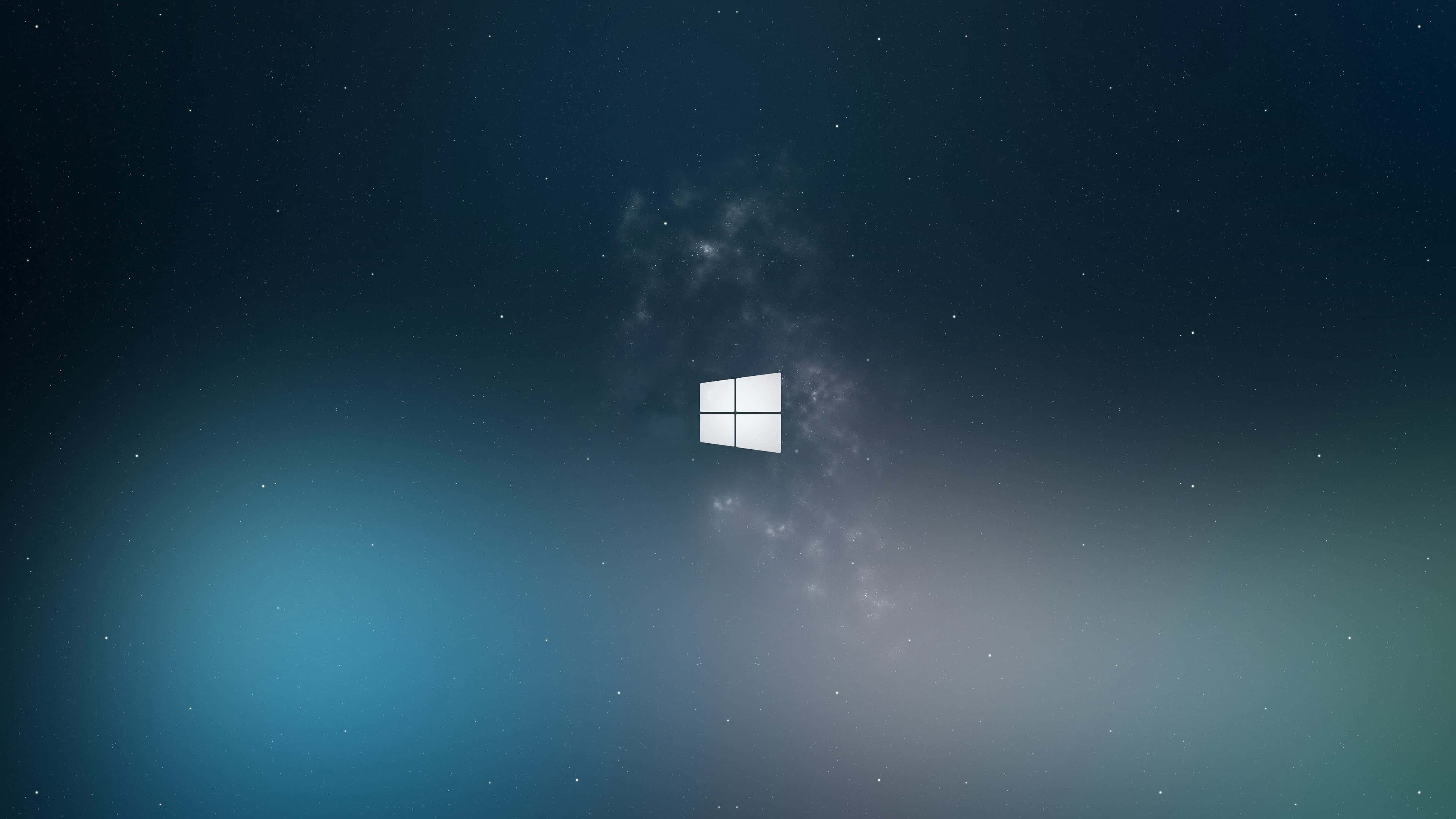 4K 桌布 壁紙 — 發光的Windows標誌漂浮在星空宇宙星雲中，帶有藍色和紫色漸變。