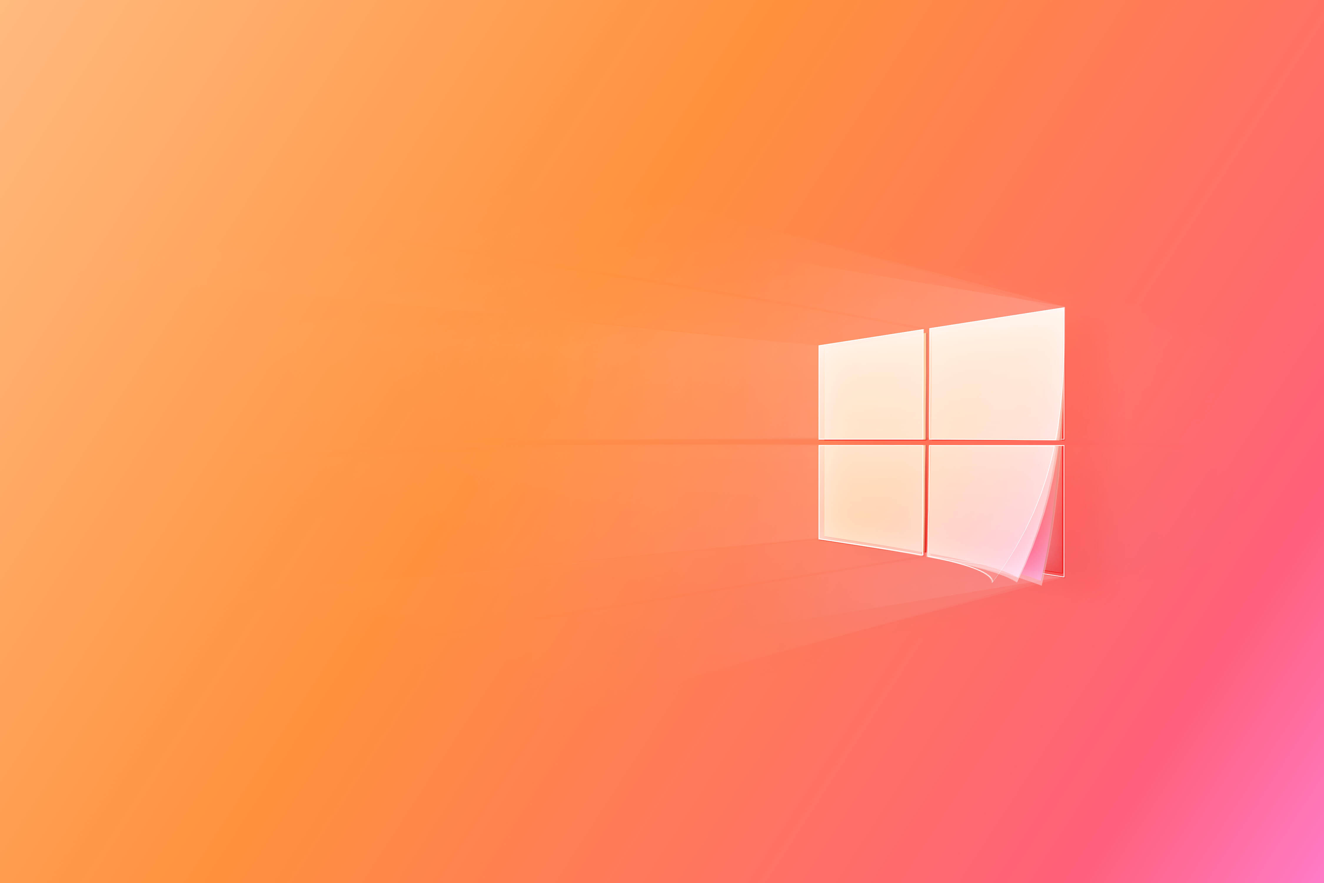 Windows 10 高畫質 桌布 壁紙 — 發光的Windows標誌漂浮在橙色和粉色的平滑漸變背景上。
