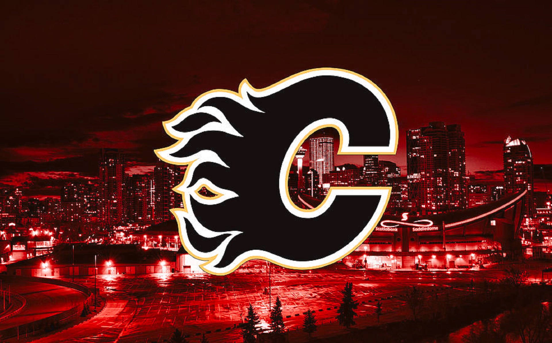 Flames 桌布 壁紙 — 發光的卡加利火焰隊標誌主導了夜晚帶有紅色調的城市景觀，包括燈火通明的摩天大樓和體育場。