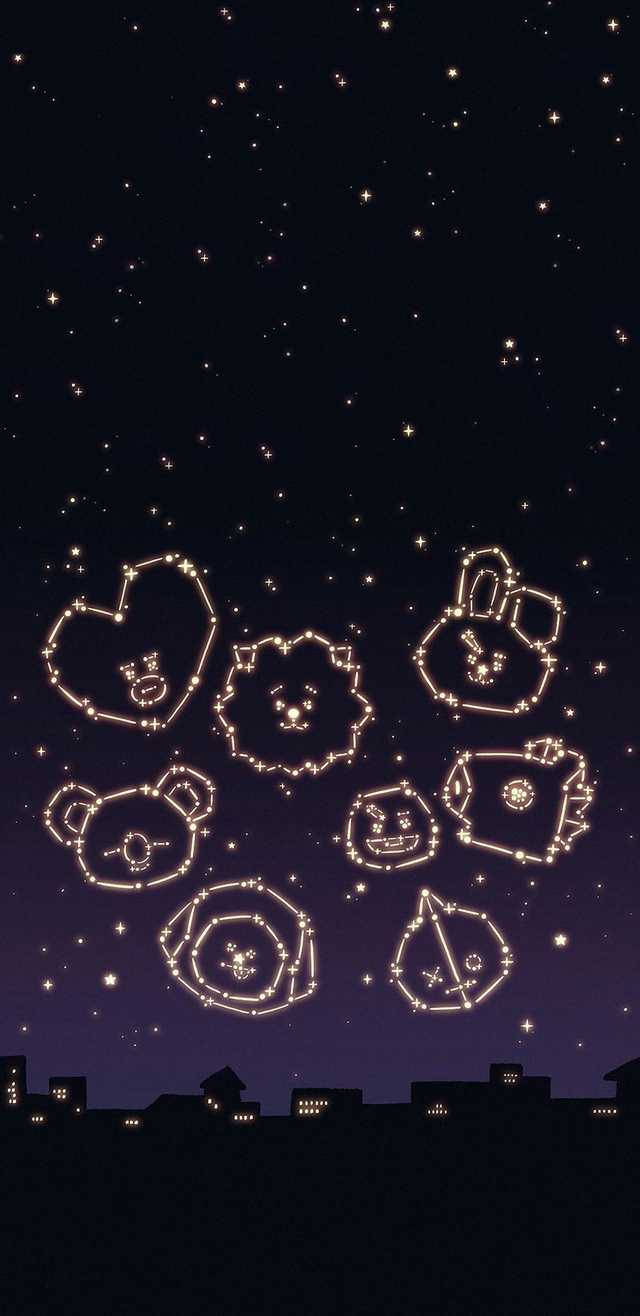 美學 BTS 桌布 壁紙 — 發光的星座形狀像可愛的動物面孔，漂浮在星空下的城市天際線上方。