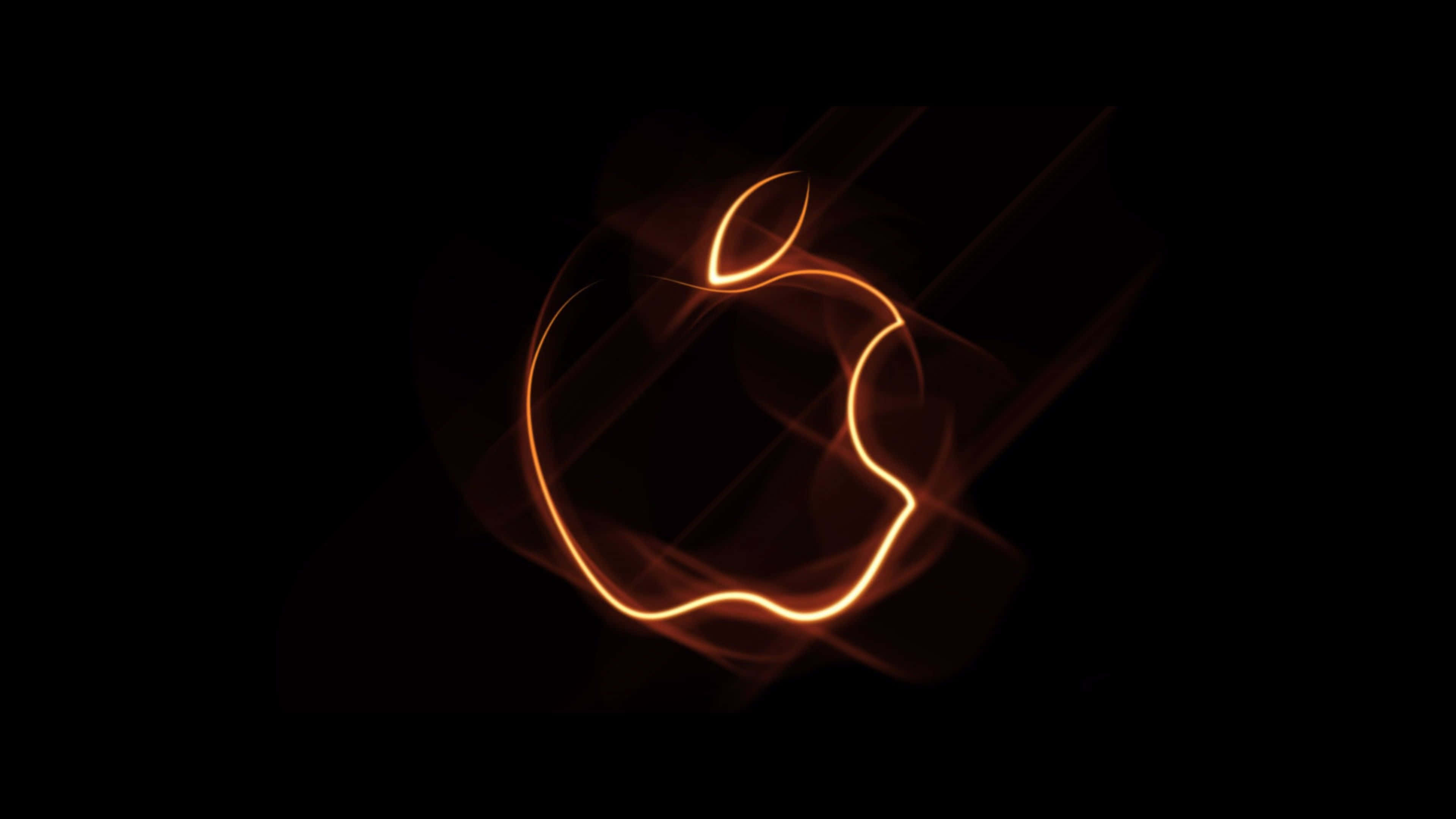 4K Apple 桌布 壁紙 — 發光的橙色Apple標誌輪廓在帶有動態模糊效果的黑色背景上閃爍。