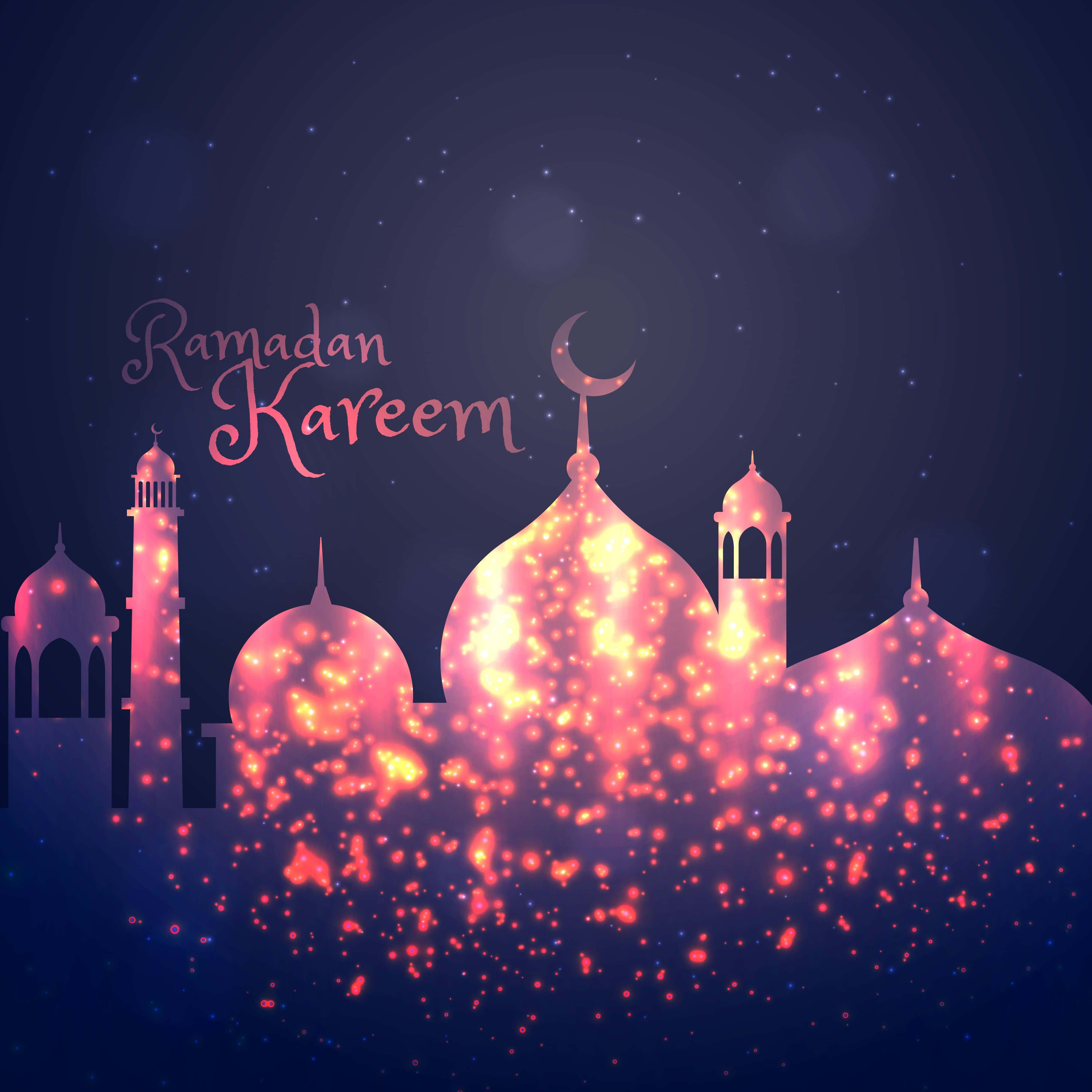 Ramadan 桌布 壁紙 — 發光的清真寺輪廓，帶有粉紅色和金色的閃光，襯托著星空夜空，有新月和 Ramadan Kareem 文字。