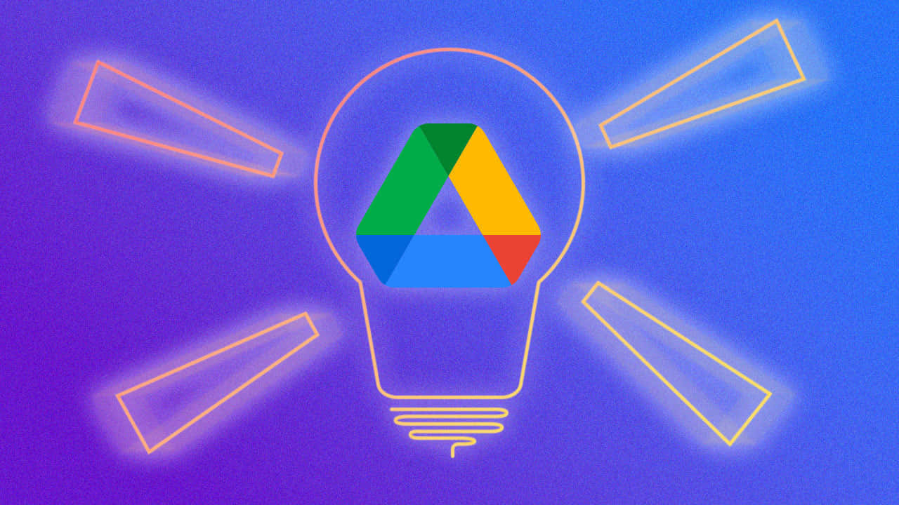 科技動圖 桌布 壁紙 — 發光的燈泡輪廓包含 Google Drive 標誌，並有霓虹光線向外射出，背景為紫色漸變。