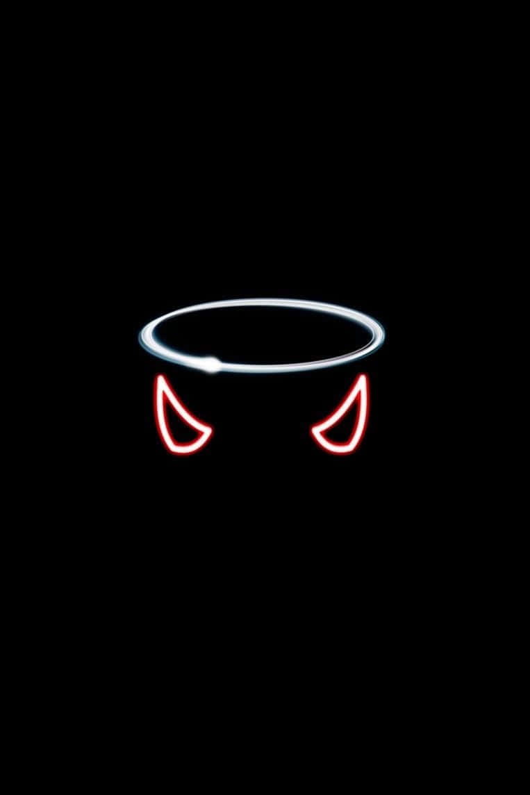 Devil Horns 桌布 壁紙 — 發光的白色光環和紅色惡魔角在純黑色背景上漂浮，營造出鮮明的天使與惡魔二元性。