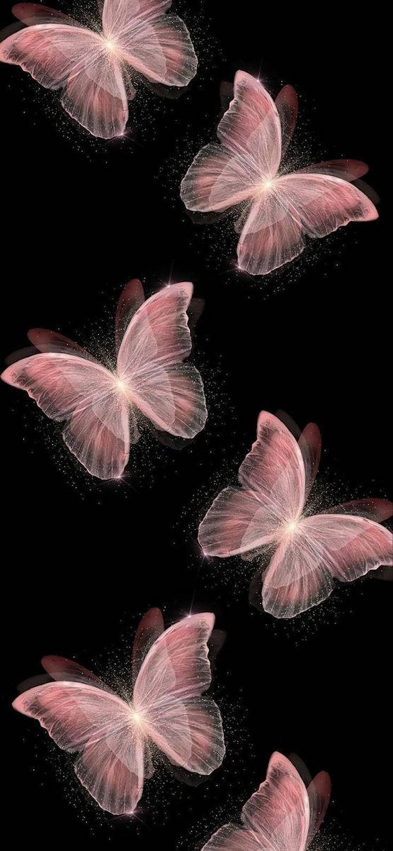 Butterflies 桌布 壁紙 — 發光的粉紅色半透明蝴蝶在佈滿星星的黑色虛空中飄浮，翅膀散發出光芒。