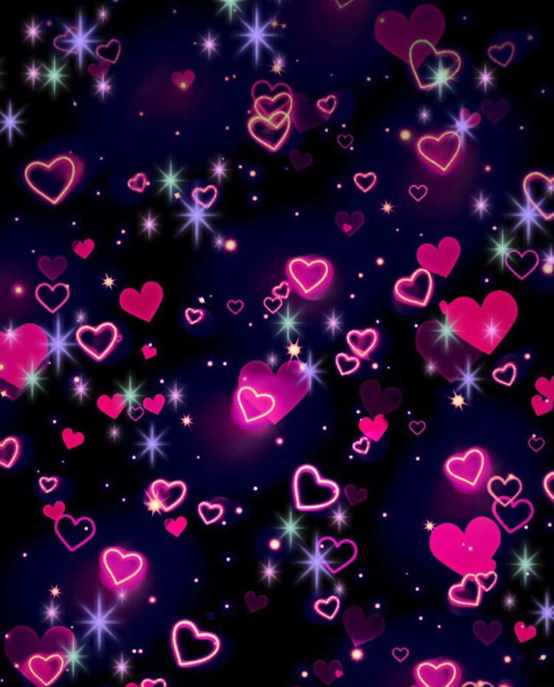Heart Pattern 桌布 壁紙 — 發光的粉紅色心形和閃爍的星星漂浮在深邃的宇宙夜空之上。