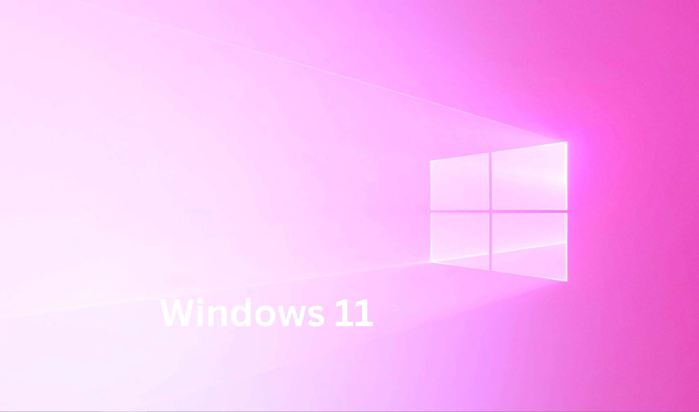 Windows 11 桌布 壁紙 — 發光的粉紅色漸變背景展示了Windows 11標誌，作為一個半透明窗口散發出柔和光線。