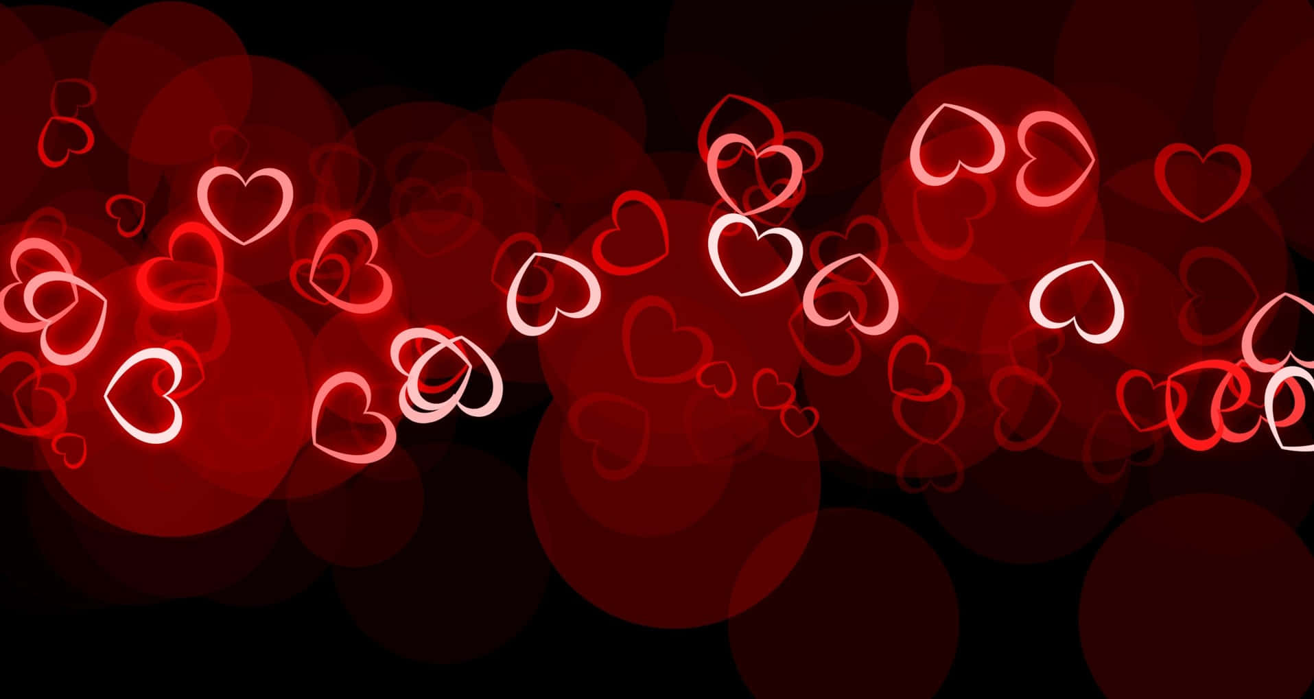 High Resolution Valentines Day 桌布 壁紙 — 發光的紅色心形輪廓漂浮在深色背景上，帶有柔和模糊的散景圓圈。