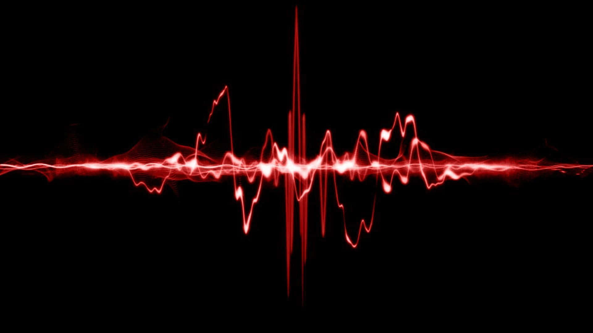 Sound Waves 桌布 壁紙 — 發光的紅色心跳波形在純黑色背景上以電能脈動。