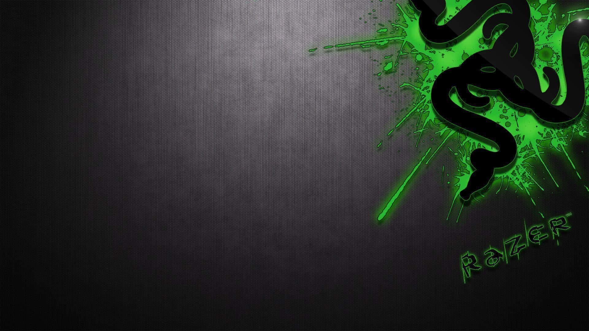 雷蛇 桌布 壁紙 — 發光的綠色Razer標誌在深色紋理金屬背景上動態飛濺。