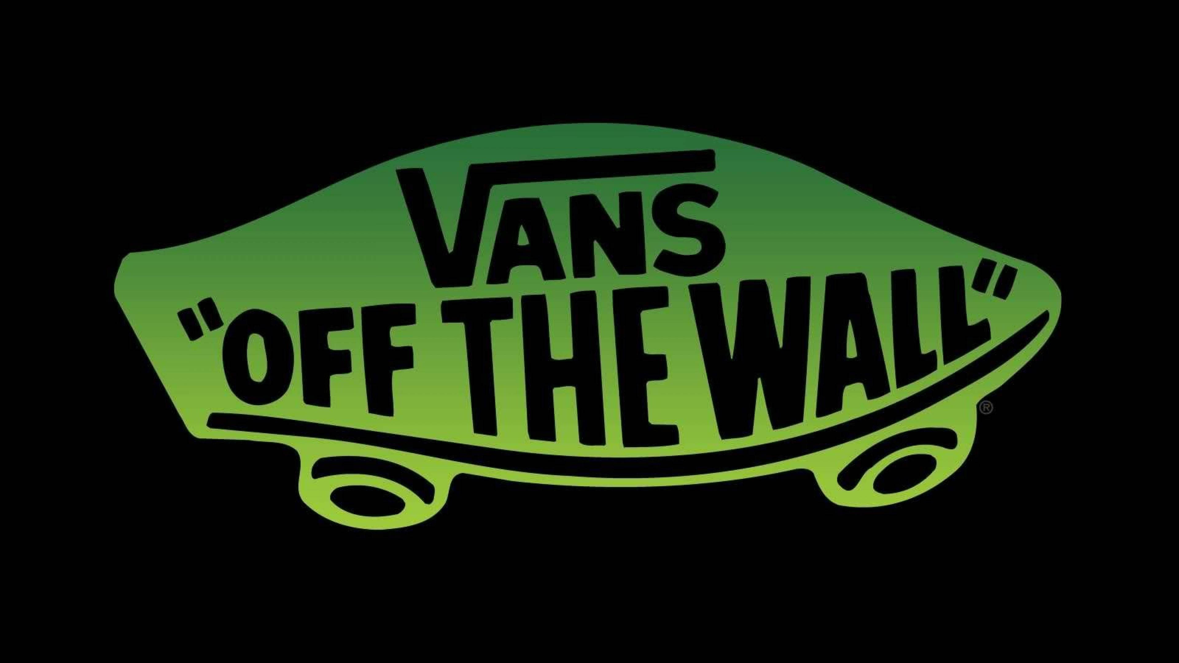 Vans Off The Wall 桌布 壁紙 — 發光的綠色Vans滑板標誌，在純黑色背景上帶有粗體黑色文字「OFF THE WALL」。