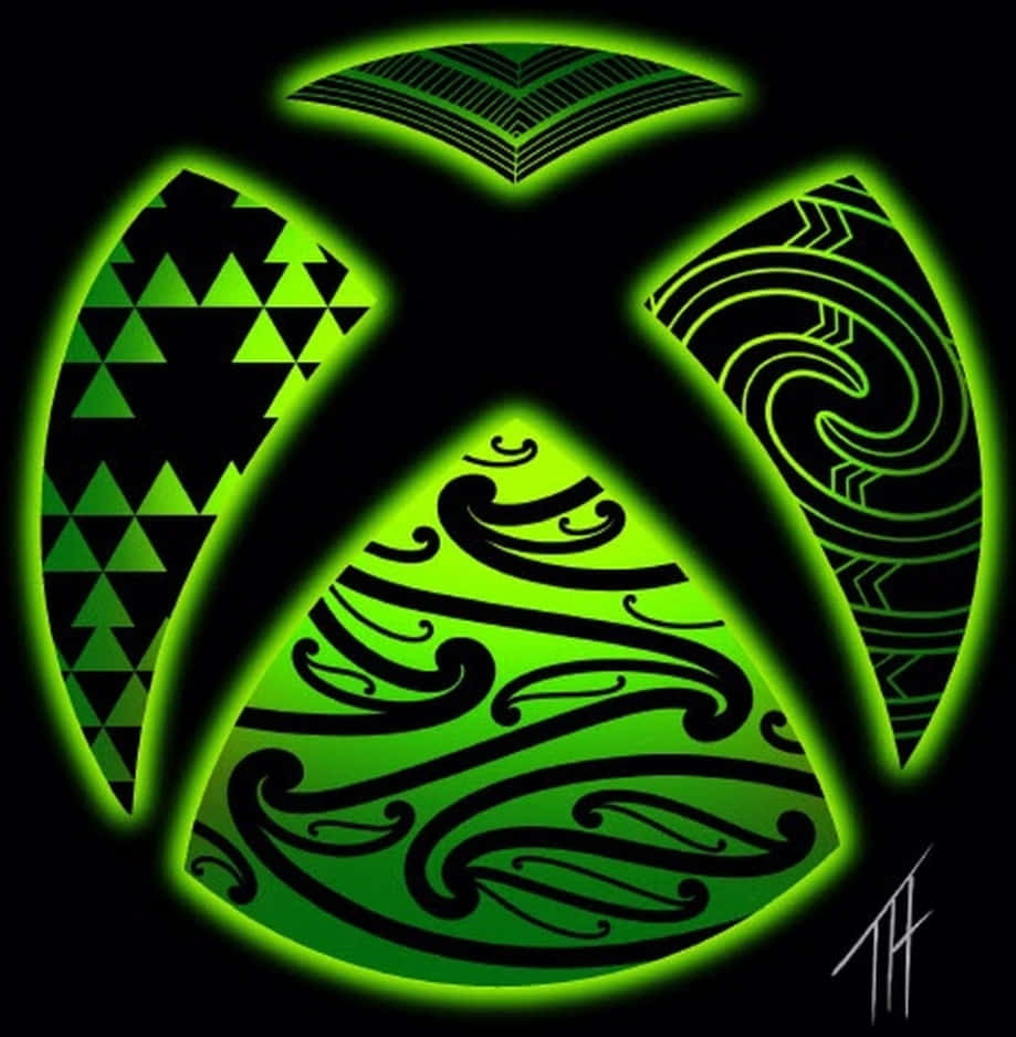 Xbox 桌布 壁紙 — 發光的綠色Xbox標誌，每個象限帶有部落圖案，背景為黑色。