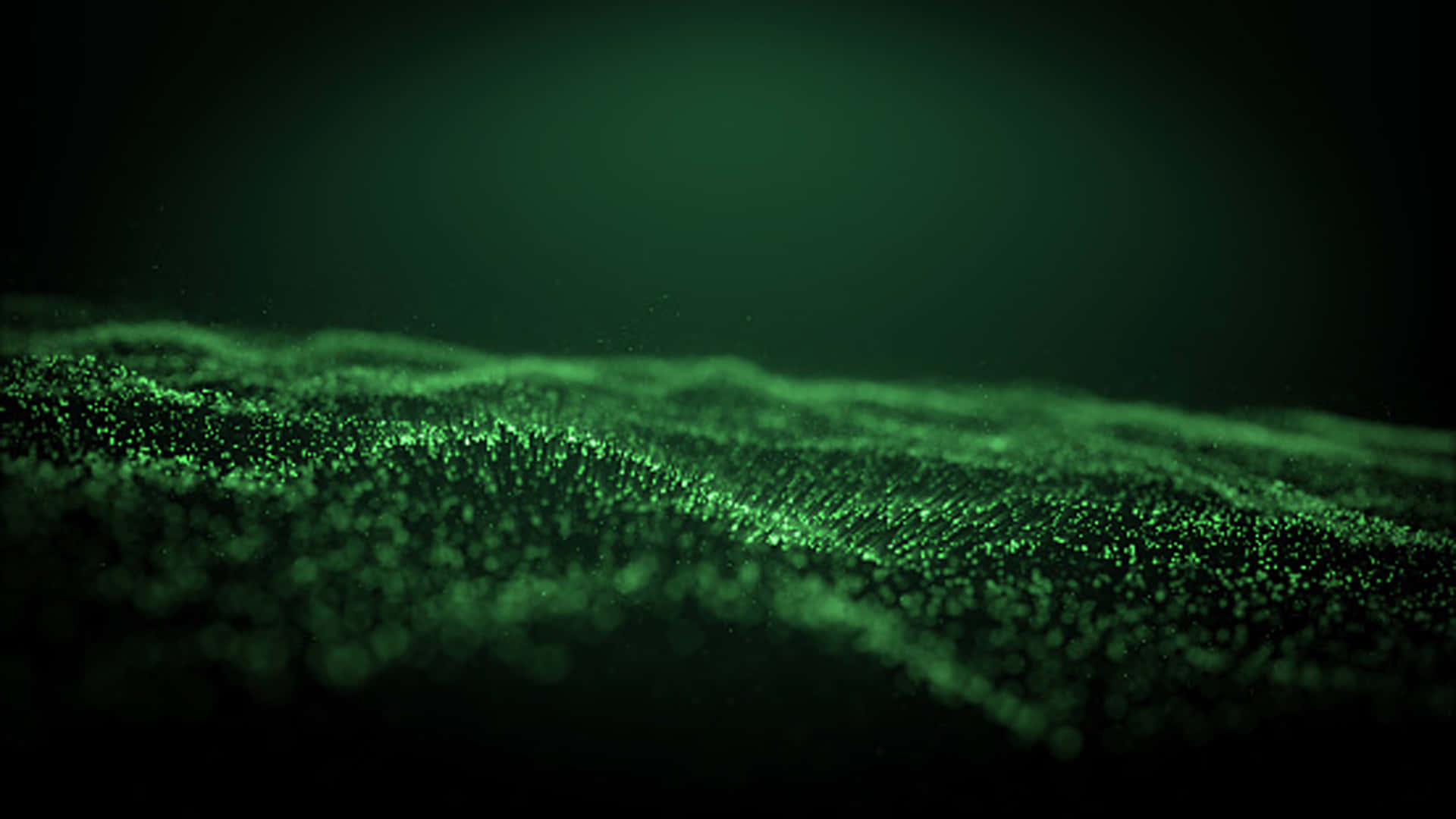 Green Glitter 桌布 壁紙 — 發光的綠色粒子景觀在黑暗虛空中起伏，帶有柔和的散景高光。