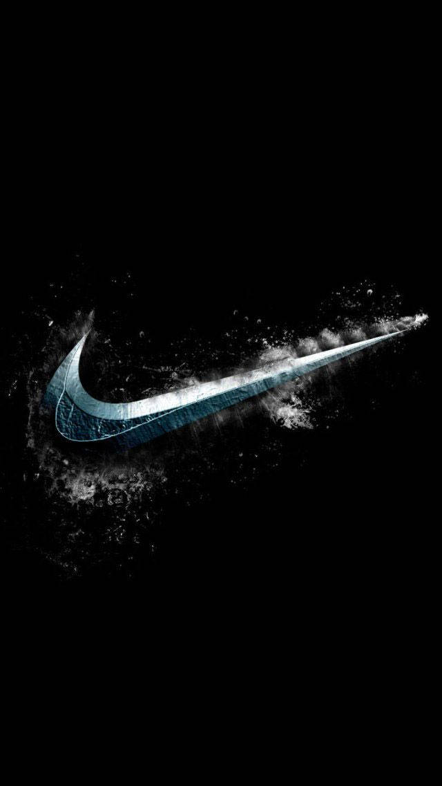 Nike iPhone 桌布 壁紙 — 發光的藍色Nike勾號帶著粒子效果和銳利光線衝破黑暗空間。