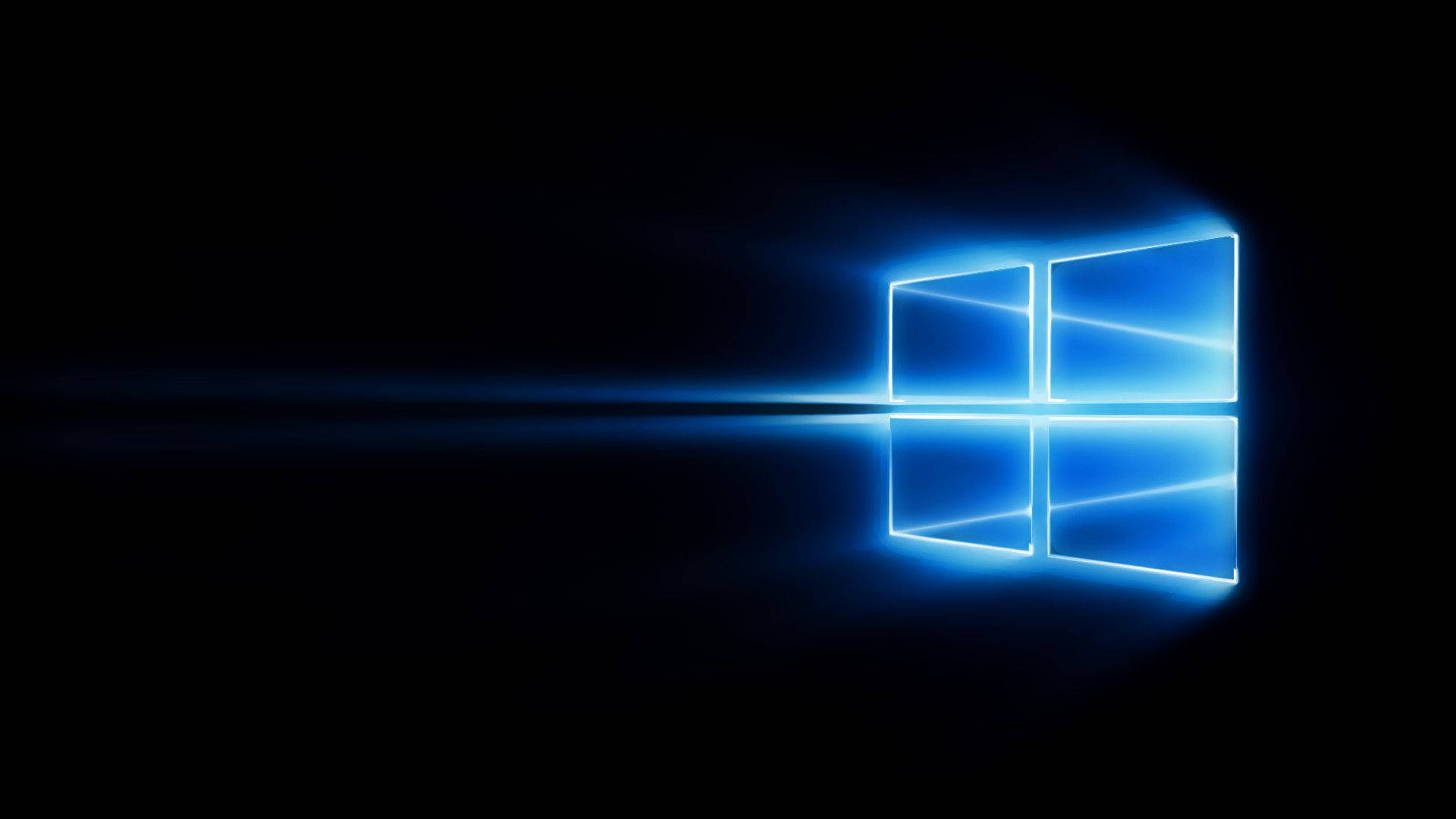 Windows 10 高畫質 桌布 壁紙 — 發光的藍色Windows標誌在黑暗背景上閃耀，帶有鏡頭光暈效果。