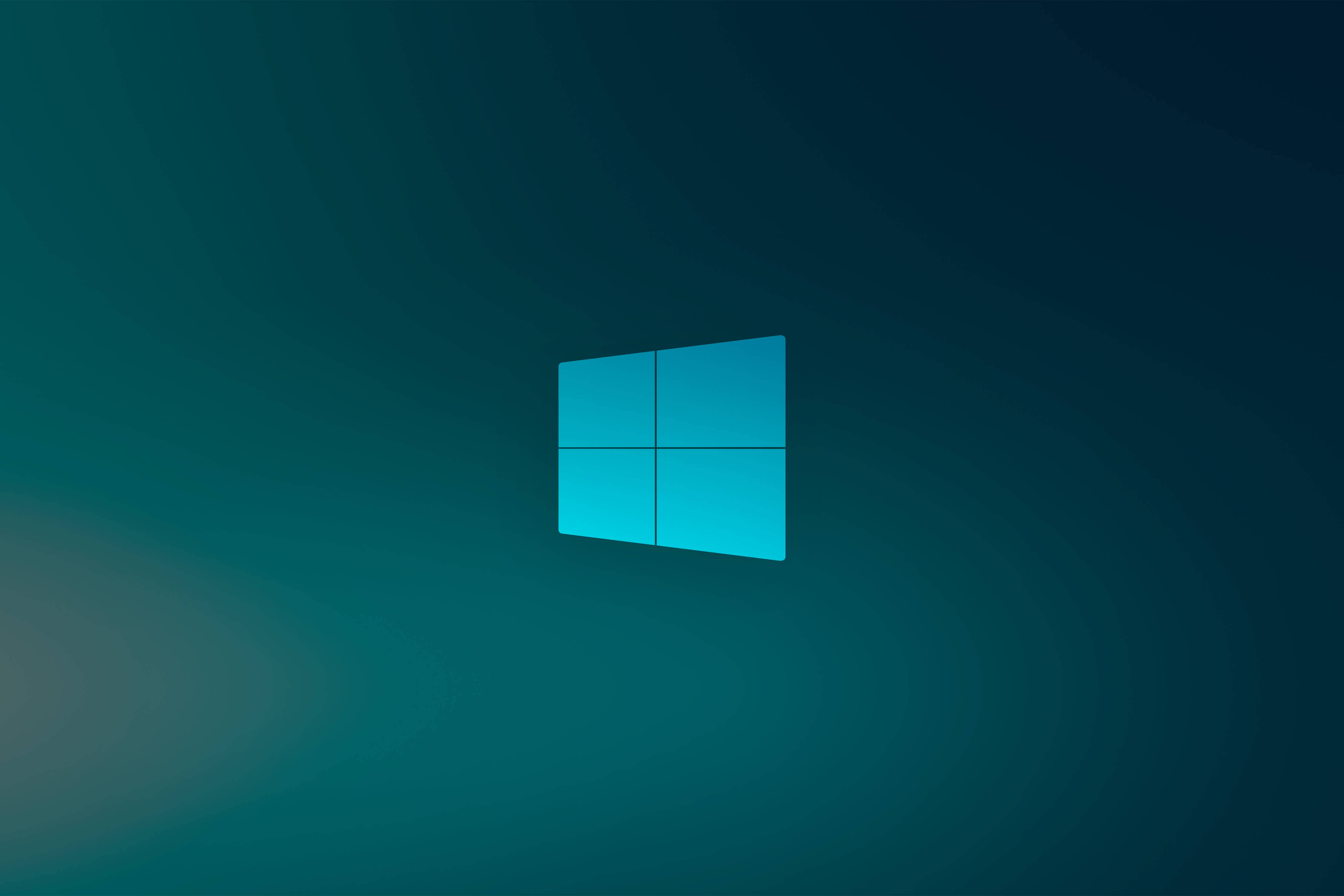 Windows 10 高畫質 桌布 壁紙 — 發光的藍色Windows標誌居中於青綠色和深藍色漸變背景上，帶有柔和的放射光效果。