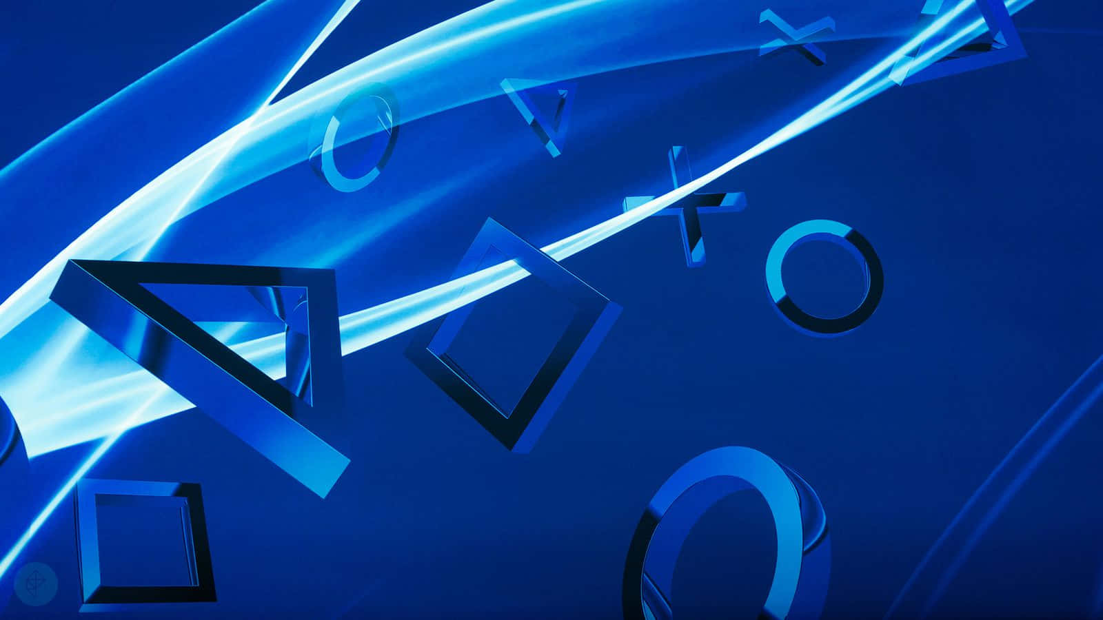 PlayStation 桌布 壁紙 — 發光的藍色幾何形狀和符號在深藍色漸變背景上動態漂浮。