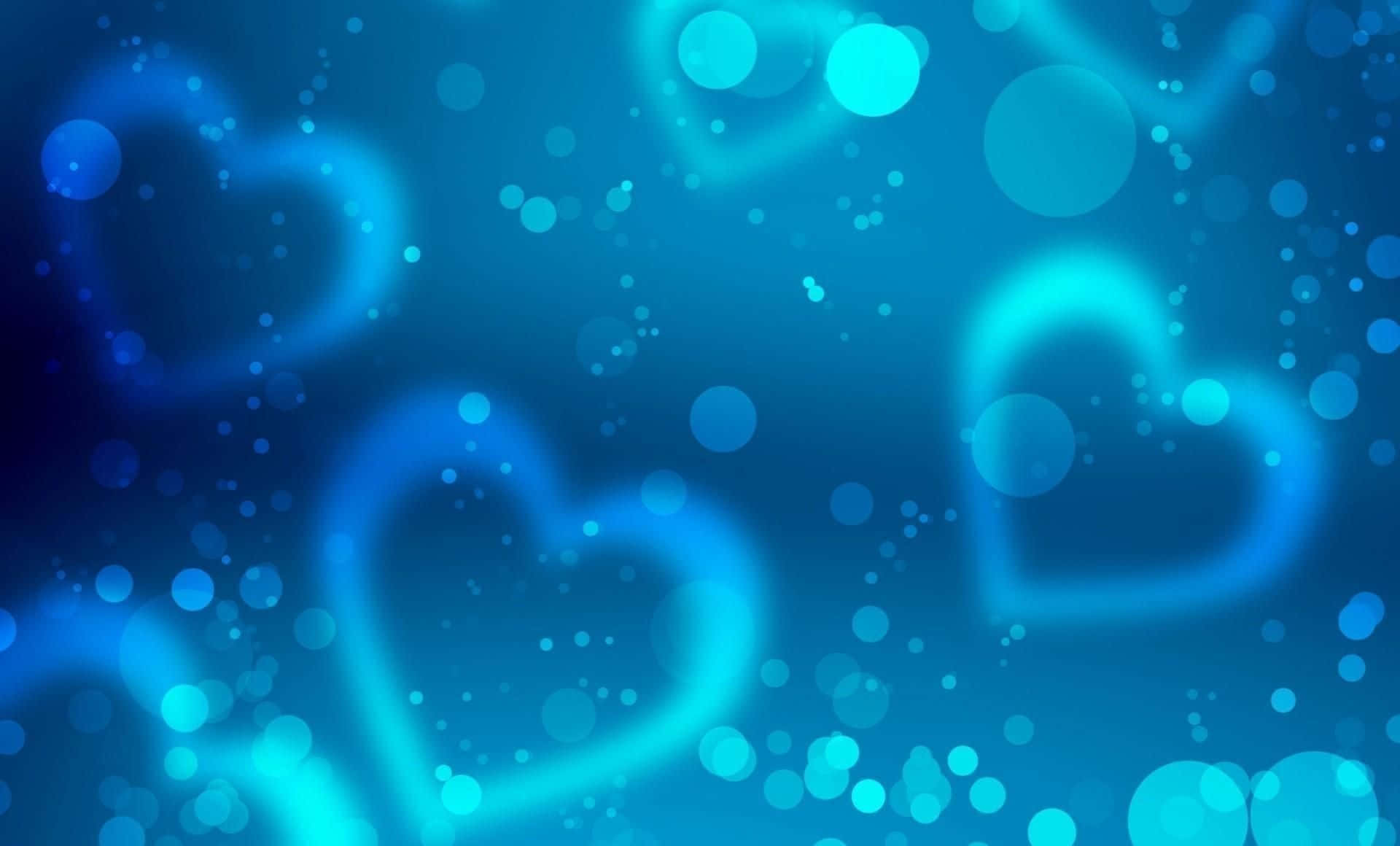 Blue Heart 桌布 壁紙 — 發光的藍色心形在閃爍的散景燈光中漂浮，營造出夢幻般的數位背景。