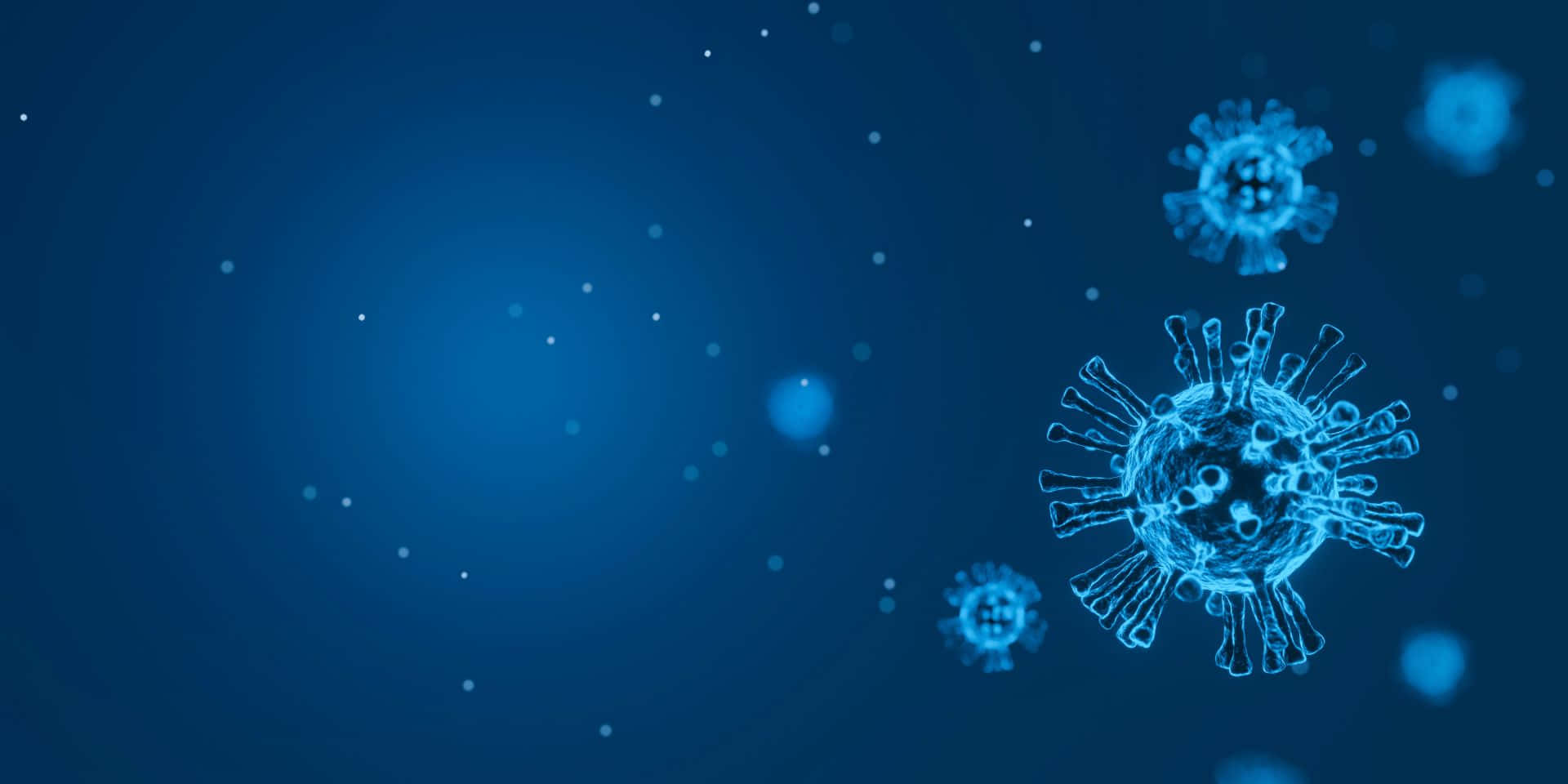 Covid 桌布 壁紙 — 發光的藍色病毒粒子在深藍色漸變背景上漂浮，帶有柔和散景光點。
