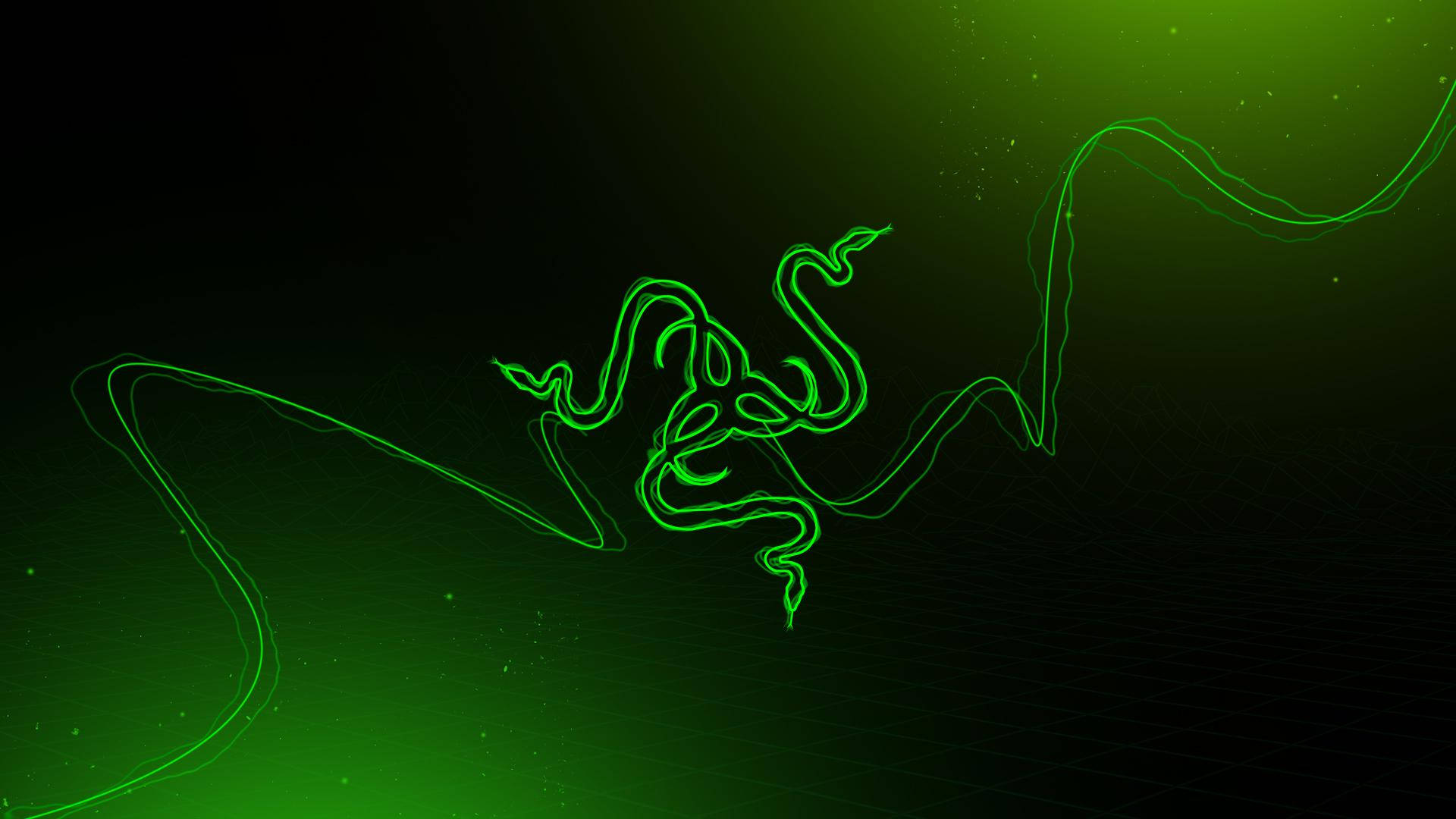 雷蛇 桌布 壁紙 — 發光的霓虹綠色 Razer 標誌在深色漸變背景上蜿蜒，帶有微妙的粒子效果。