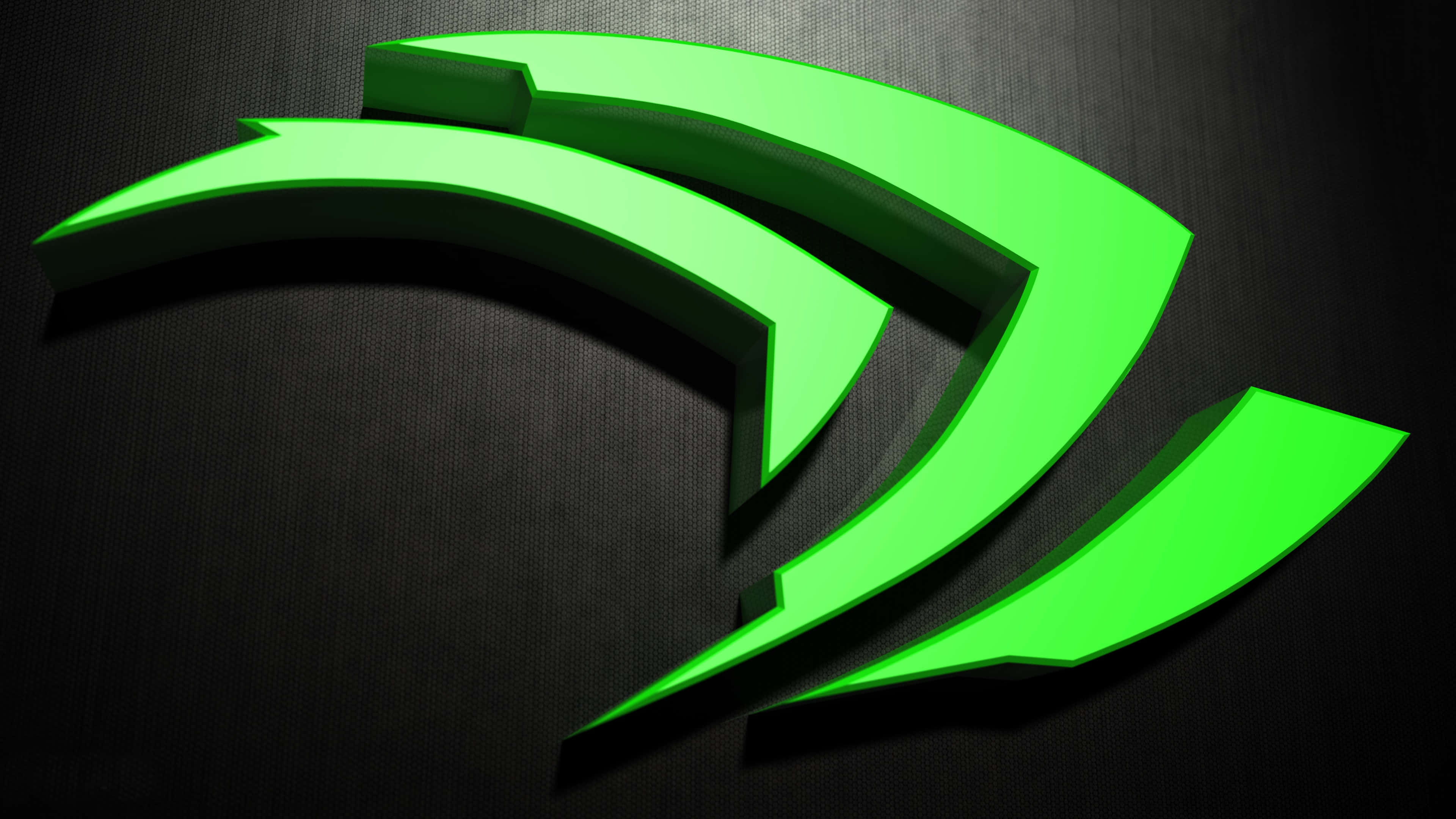 nvidia 桌布 壁紙 — 發光的霓虹綠色NVIDIA標誌，帶有銳利的3D邊緣，在深色紋理表面上投射出戲劇性的陰影。