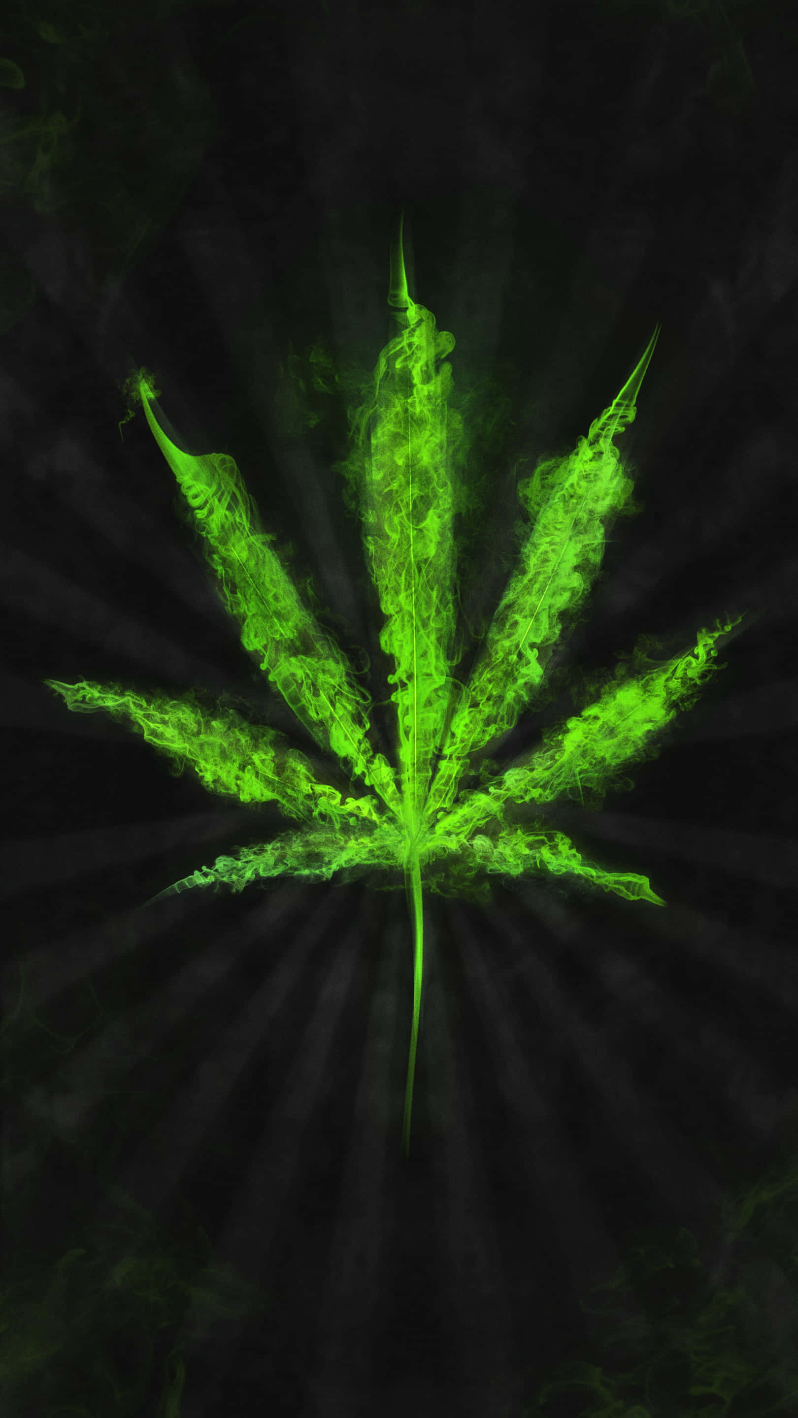Trippy Art 桌布 壁紙 — 發光的霓虹綠色大麻葉在黑暗煙霧背景中散發出戲劇性的光線。