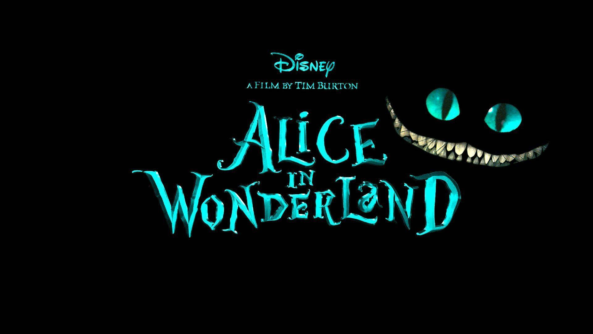 wonderland 桌布 壁紙 — 發光的青綠色柴郡貓笑容和標題文字在漆黑的背景上漂浮，風格奇幻而異想天開。