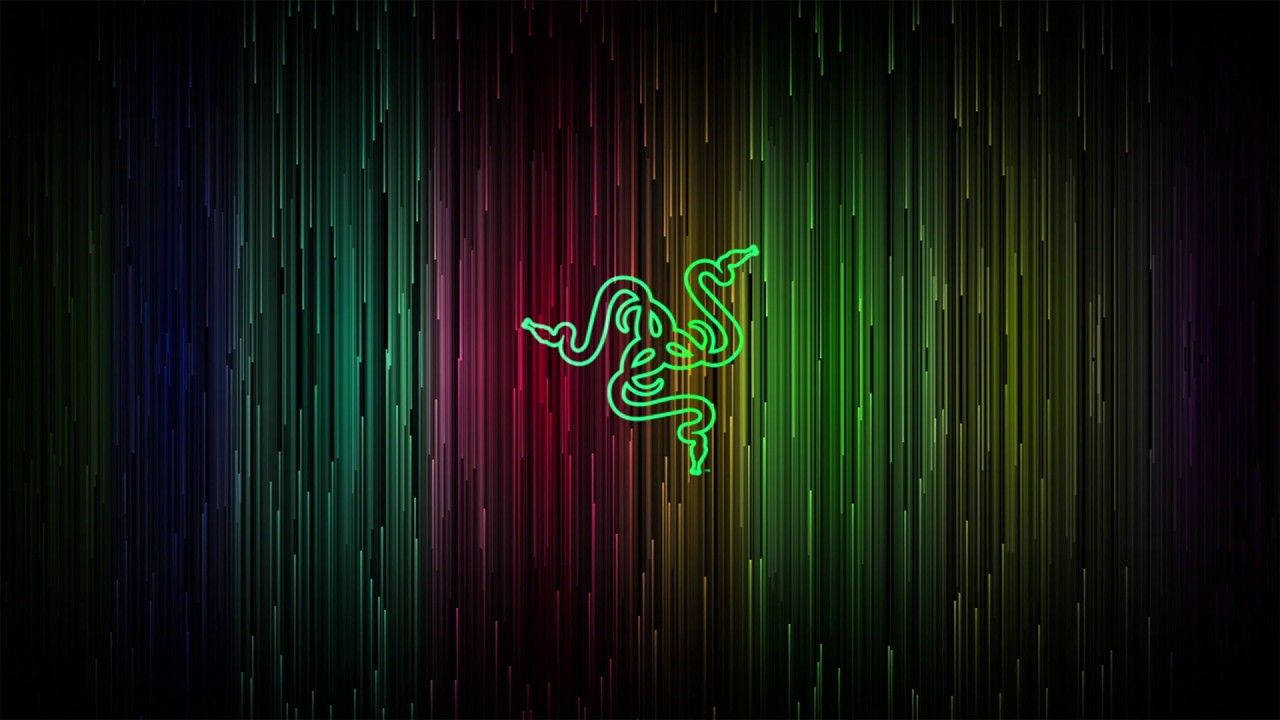 雷蛇 桌布 壁紙 — 發光綠色Razer標誌置於鮮豔垂直彩虹漸變背景中央。