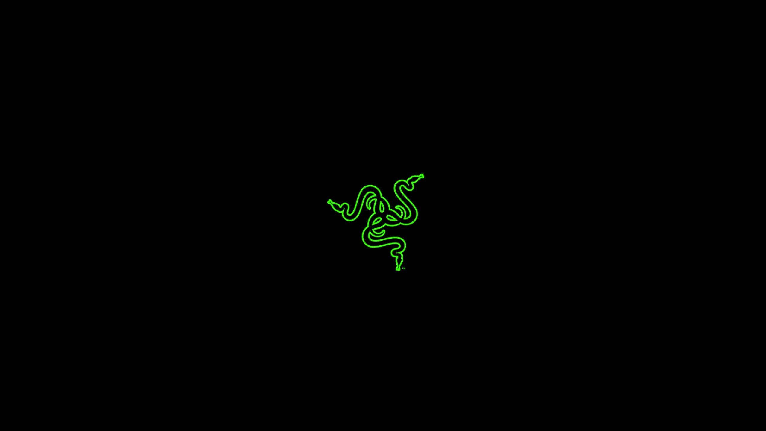 發光綠色Razer標誌蛇在黑色背景上 — 雷蛇 GIF 壁紙