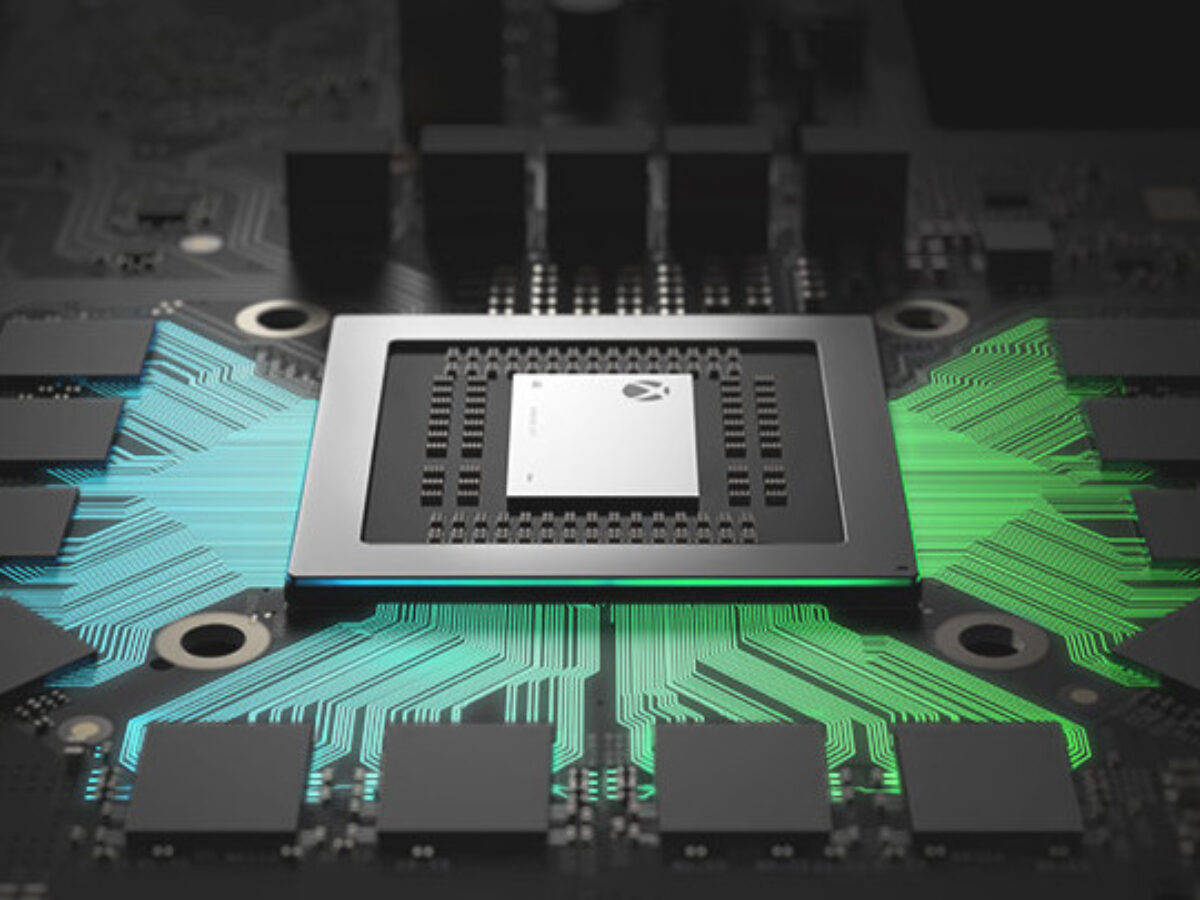 Xbox One X 桌布 壁紙 — 發光綠色和藍色電路板的特寫，中央處理器晶片在黑暗背景下被照亮。